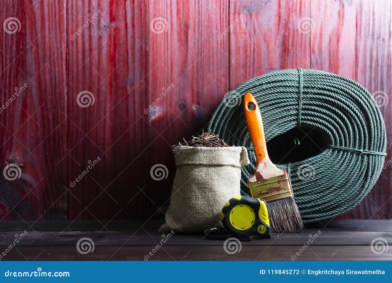 Craftsman Tool Such As String Rope, Paint Brushes, and Old Nails in