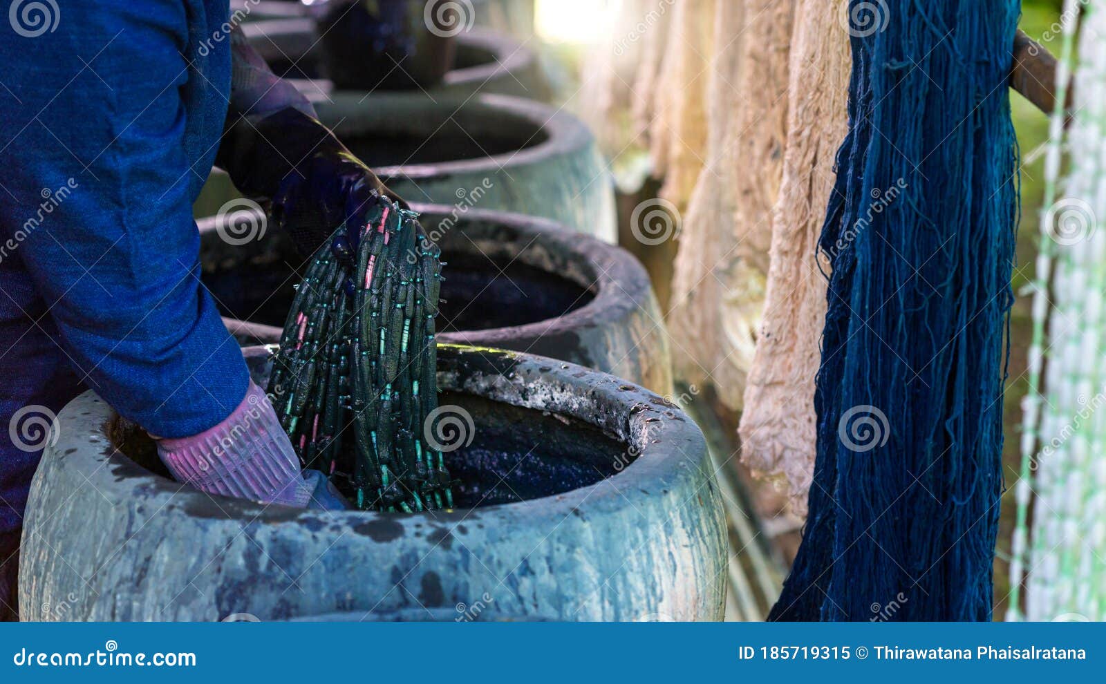 craftsmen of thai indigo cotton. indigo on hand. the jar indigo is used for dyeing cotton in natural colors is the wisdom of