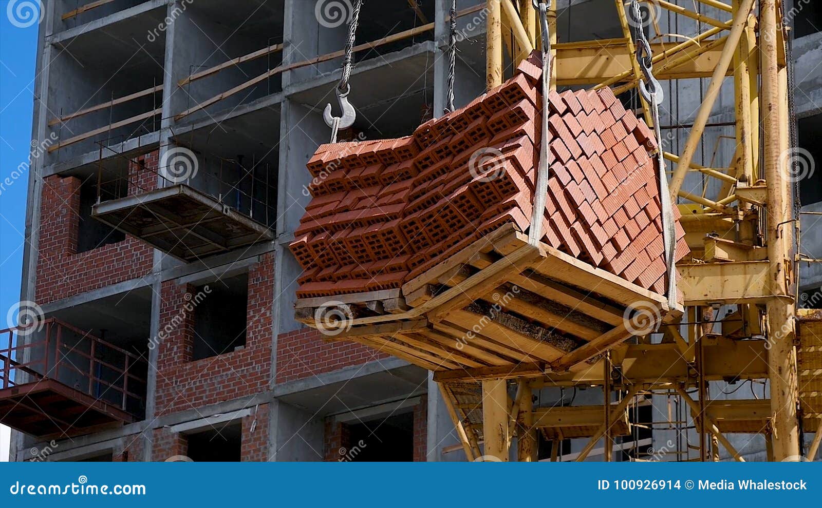 Heavy Load Hanging On Construction Site Of Brick Building ...