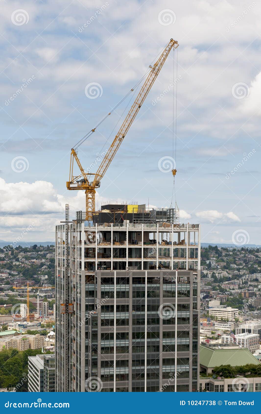 crane constructing skyscraper