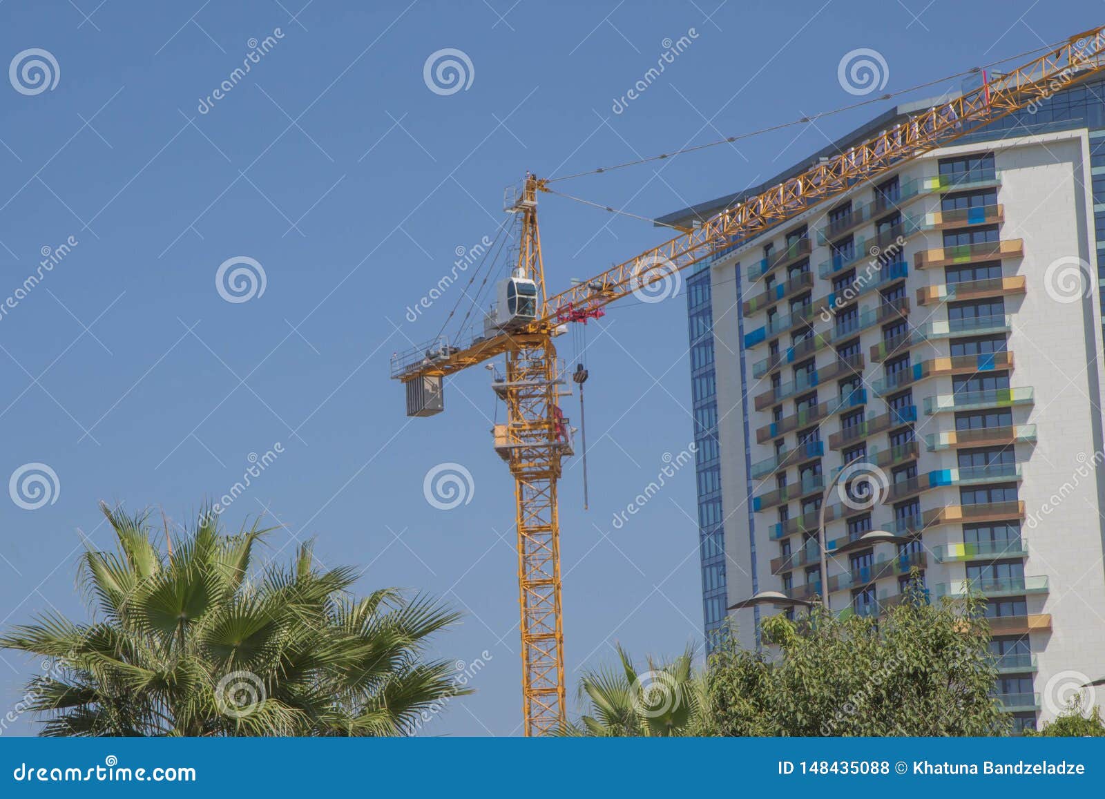 A Crane In A Construction Work. Building Crane. Lifting Crane Build
