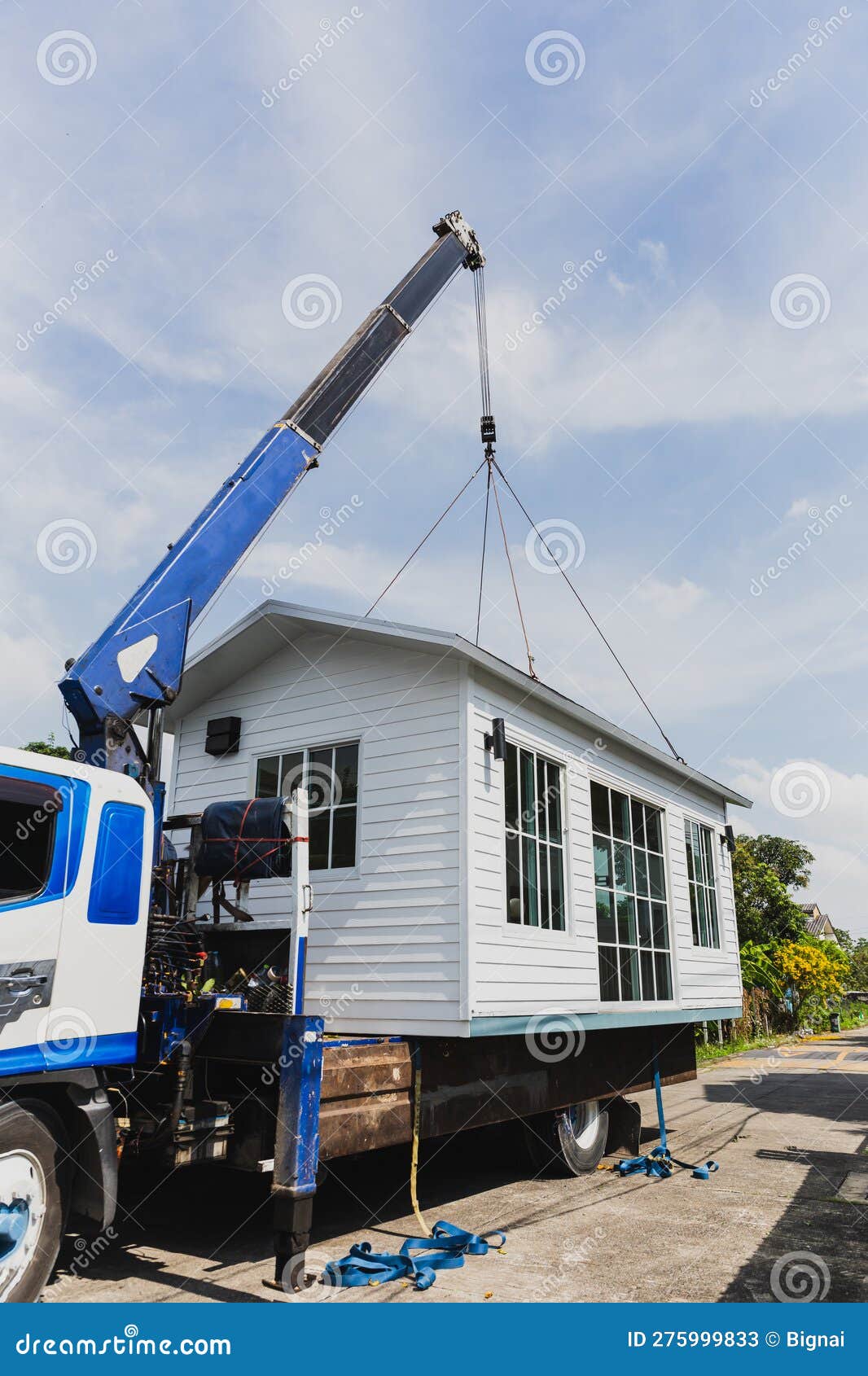 Crane Lifting a Knock Down Private House. Stock Image Image of