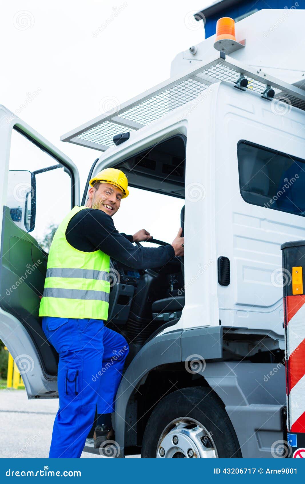 Crane Operator Driving with Truck of Construction Site Stock Image