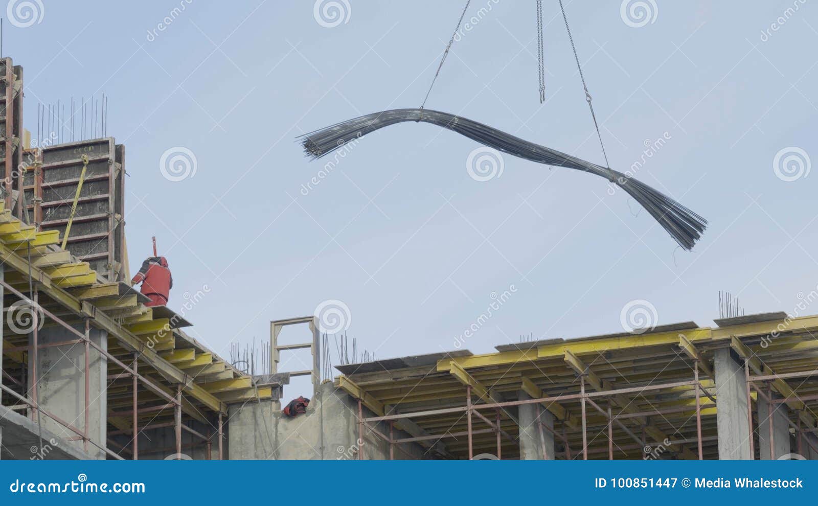 Crane Works Pipes Unloading. Working Crane Lifts the Pipe Stock Image