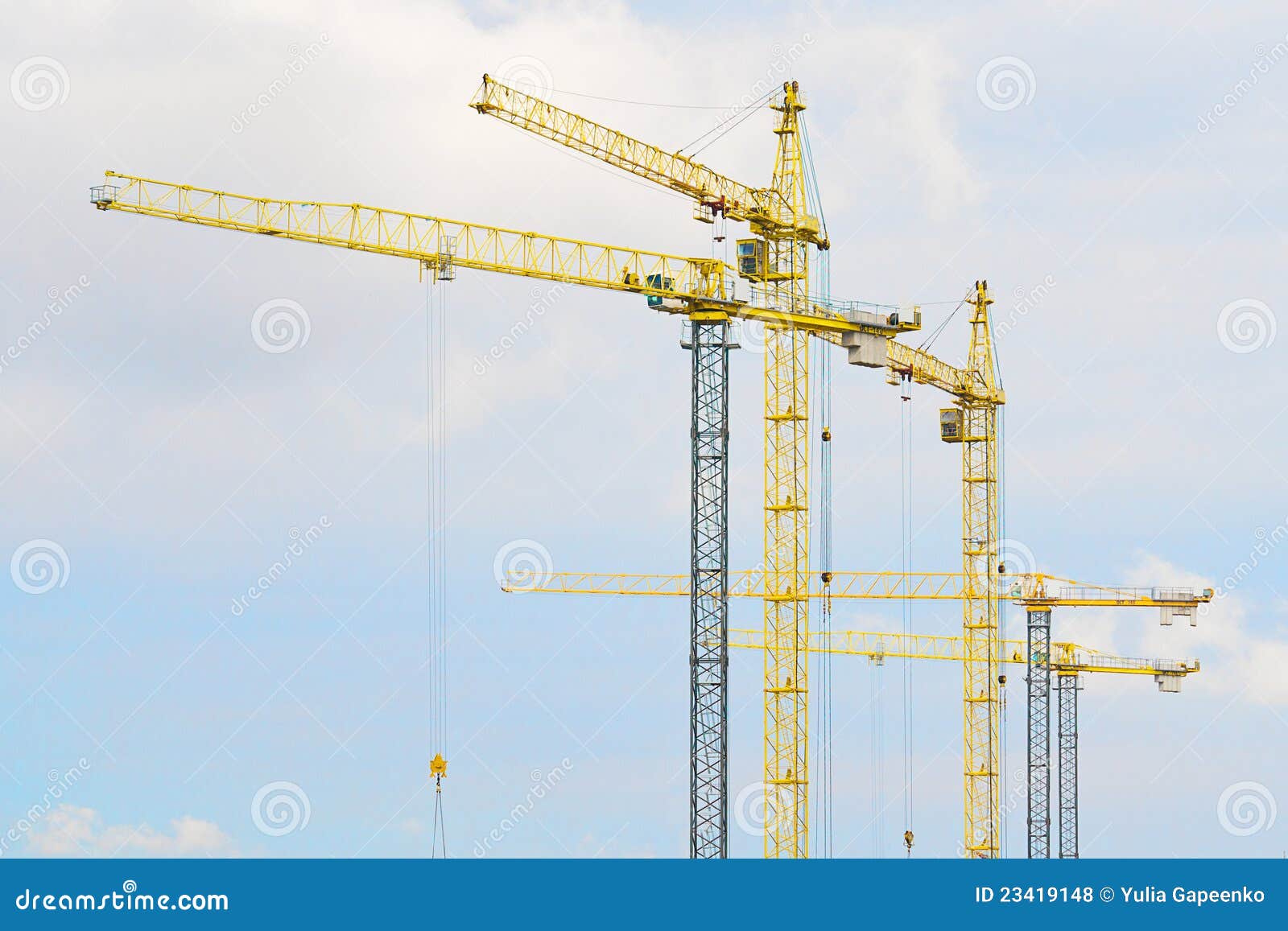 Cranes On Blue Sky Background Stock Photo - Image of four, offices