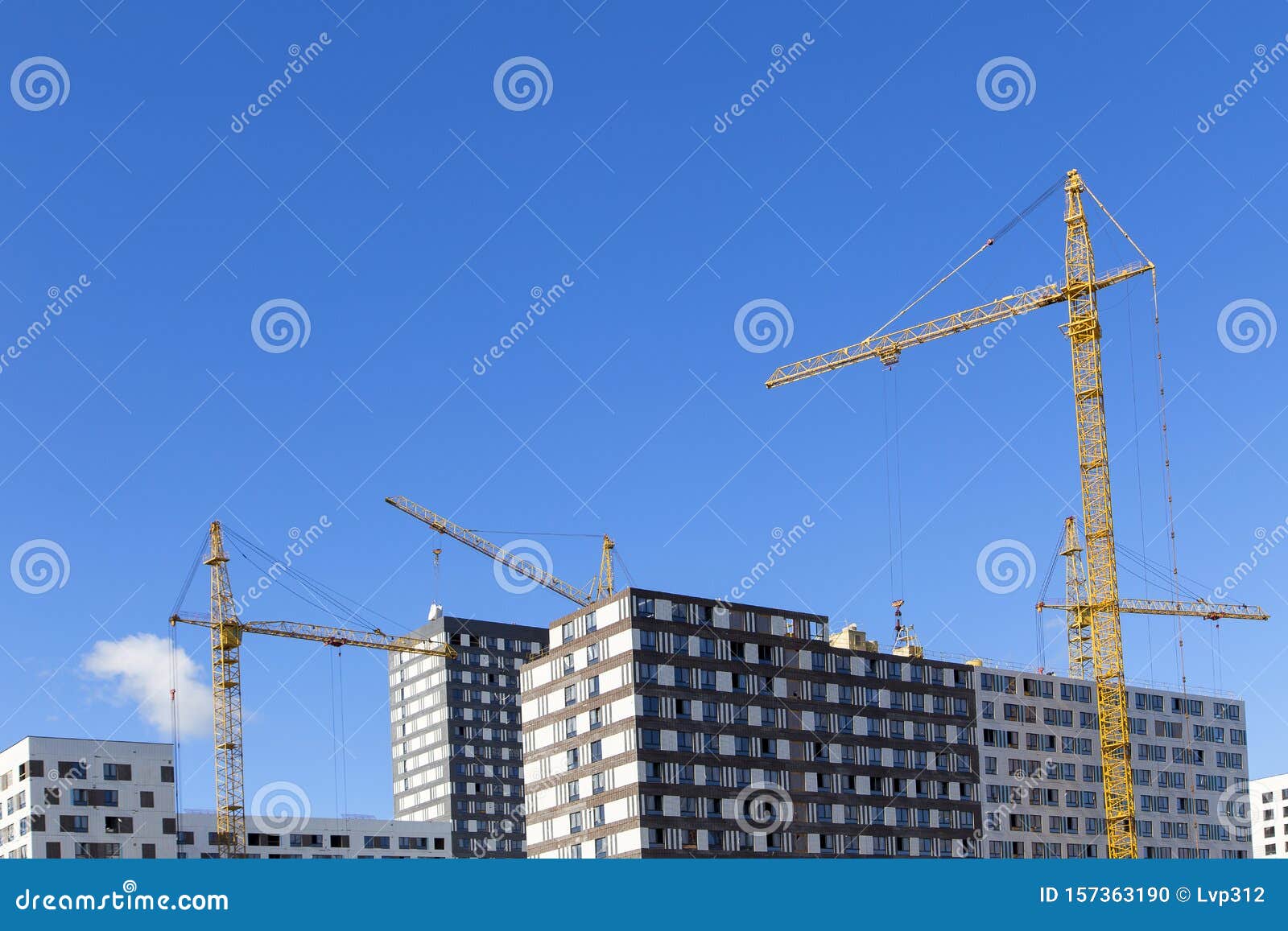 Cranes Over the House Under Construction .. Stock Photo Image of