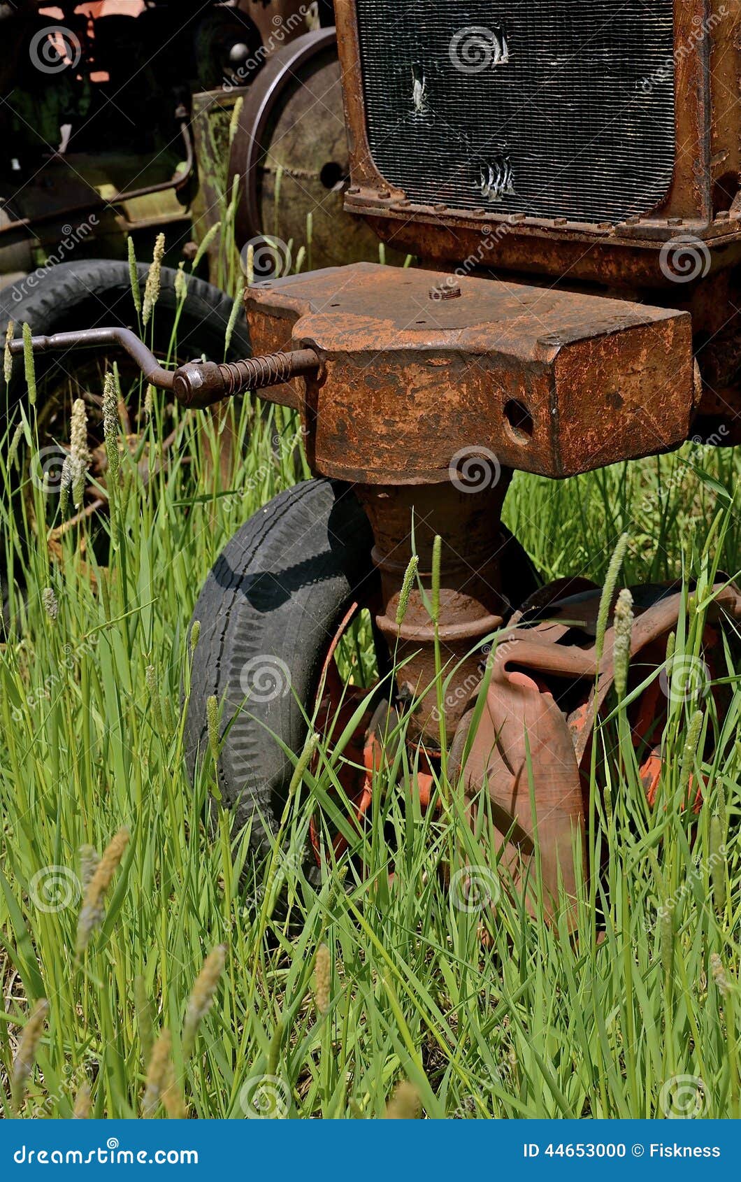 Crank of an old tractor stock photo. Image of bushes 44653000