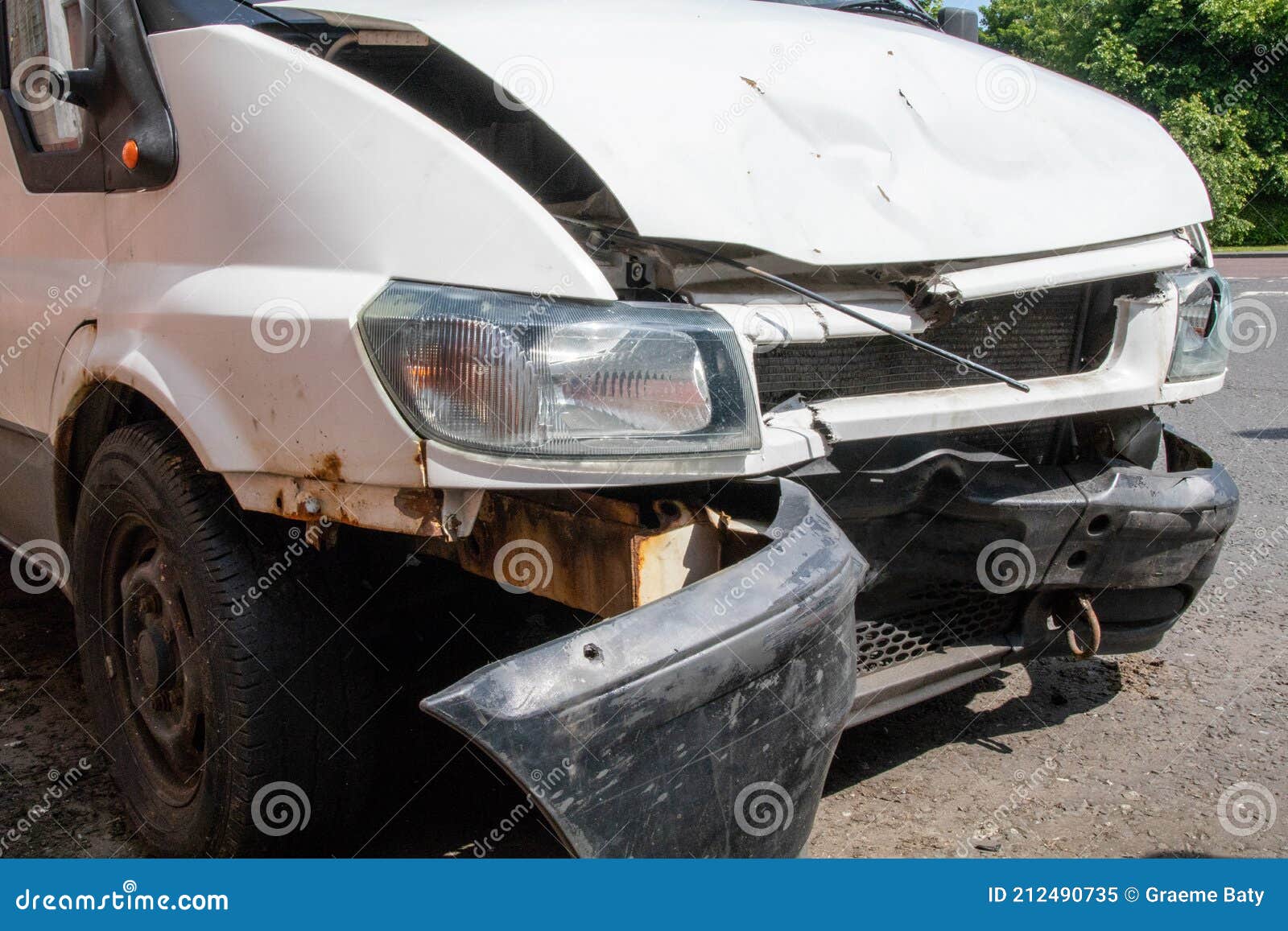 Crashed Van with Damaged Front Bumper and Radiator, Buckled