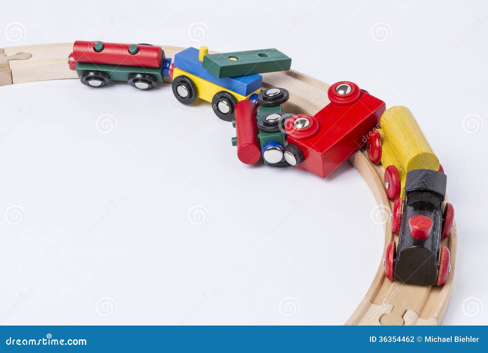 crashed-wooden-toy-train-derail-top-view-horizontal-image-36354462.jpg