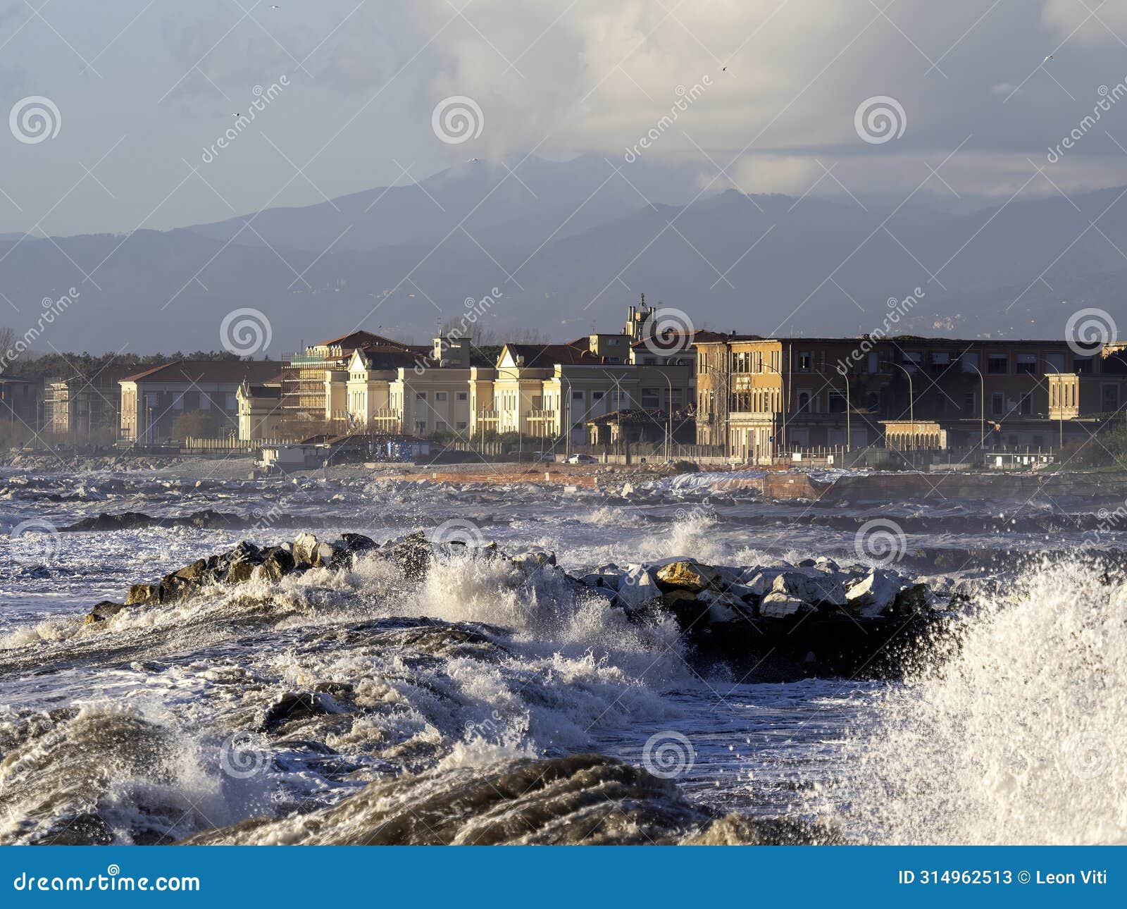 crashing waves on the beach in massa