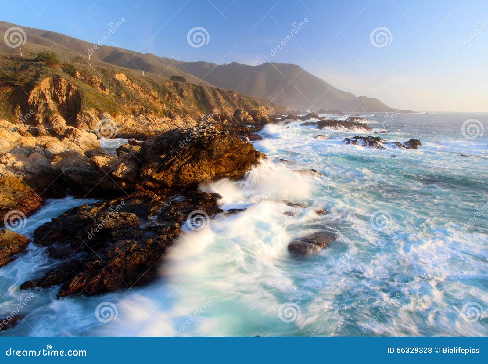 crashing waves at sunset on big sur coast, garapata state park, near monterey, california, usa