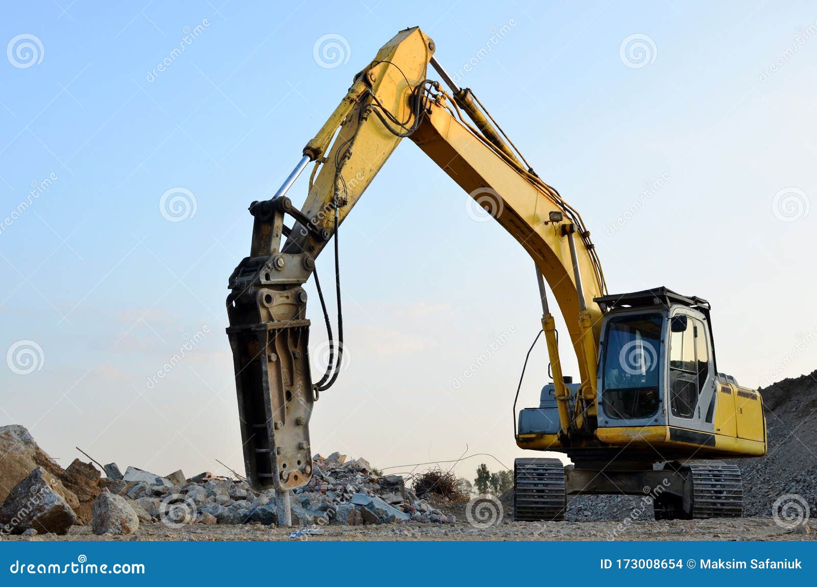 Crawler Excavator with Hydraulic Breaker Hammer for the Destruction Concrete and Hard Rock at the Construction Site or Quarry - Image of develop, 173008654
