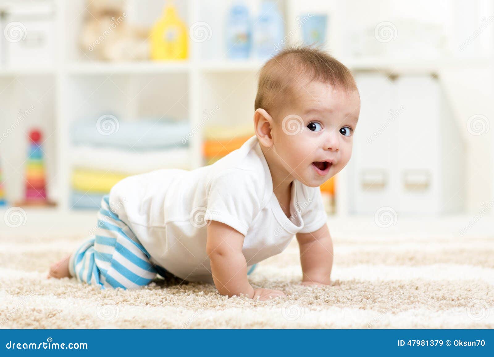 crawling baby boy indoors