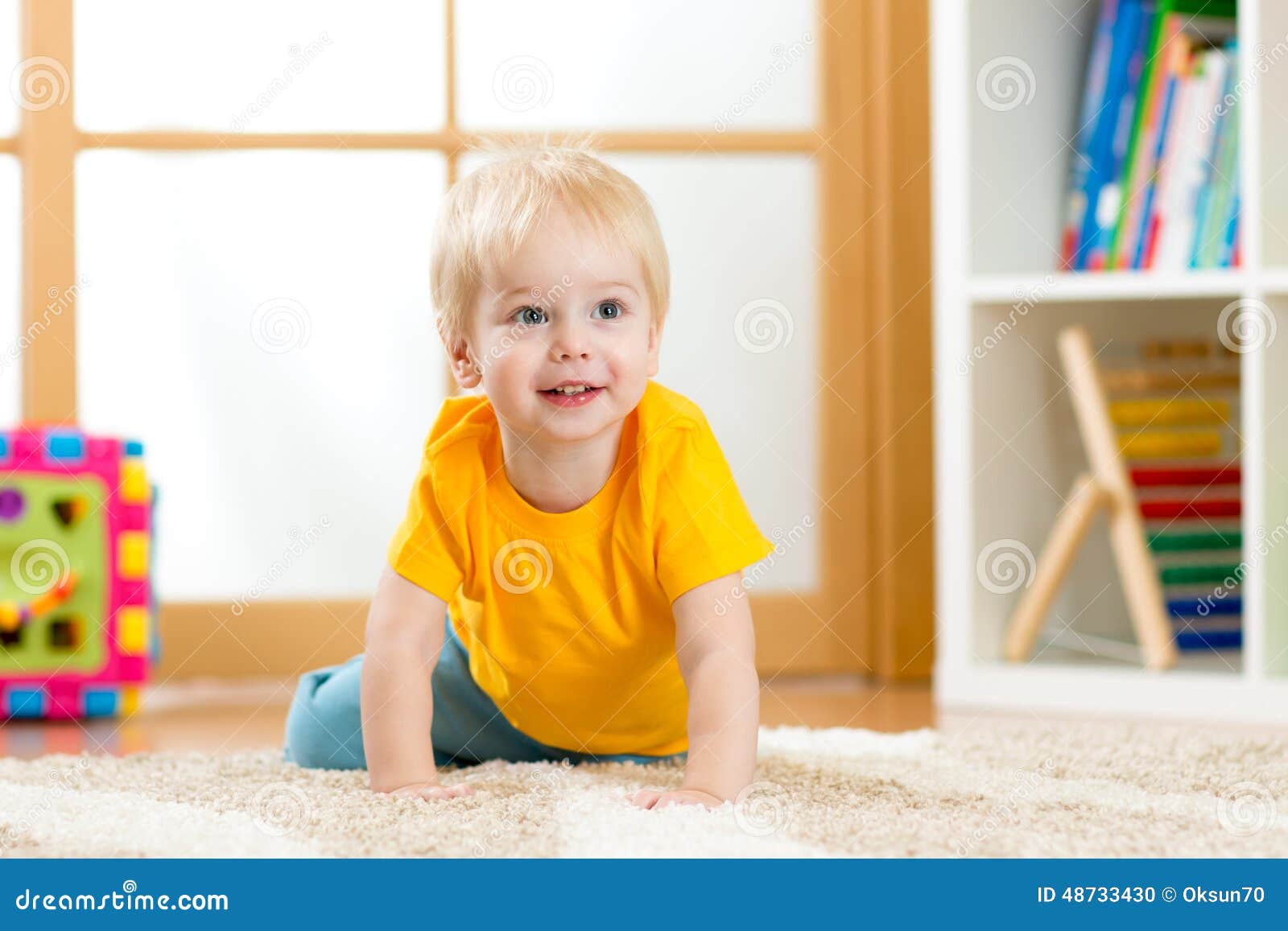 crawling baby boy indoors