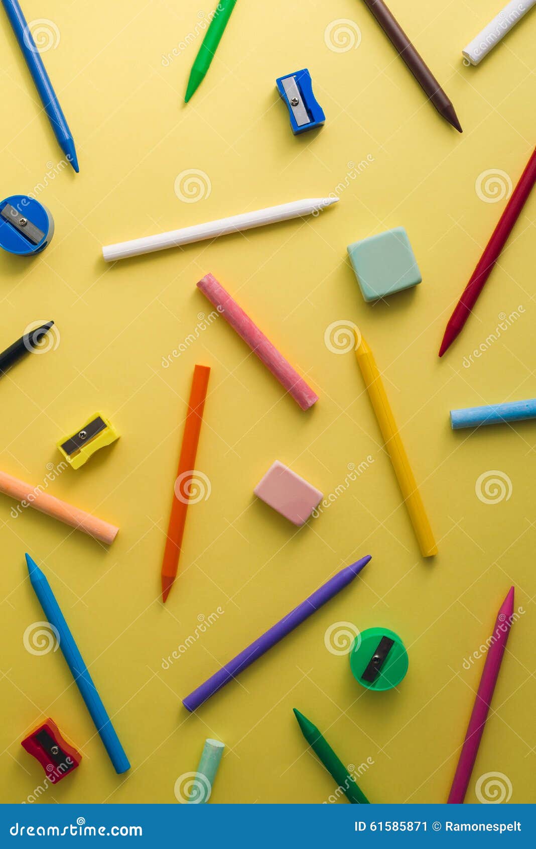Crayons, Pencil Sharpeners, Erasers and Chalks of Different Colo Stock