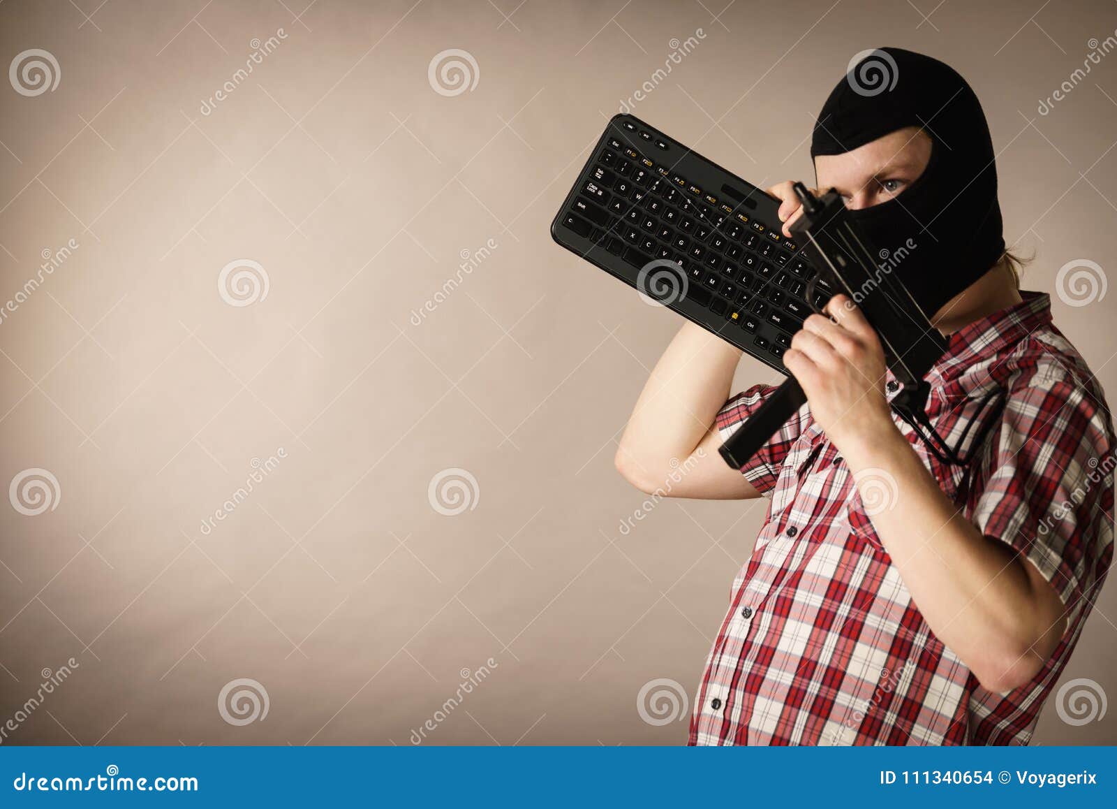 Man in Balaclava Holding Keyboard and Gun Stock Photo Image of