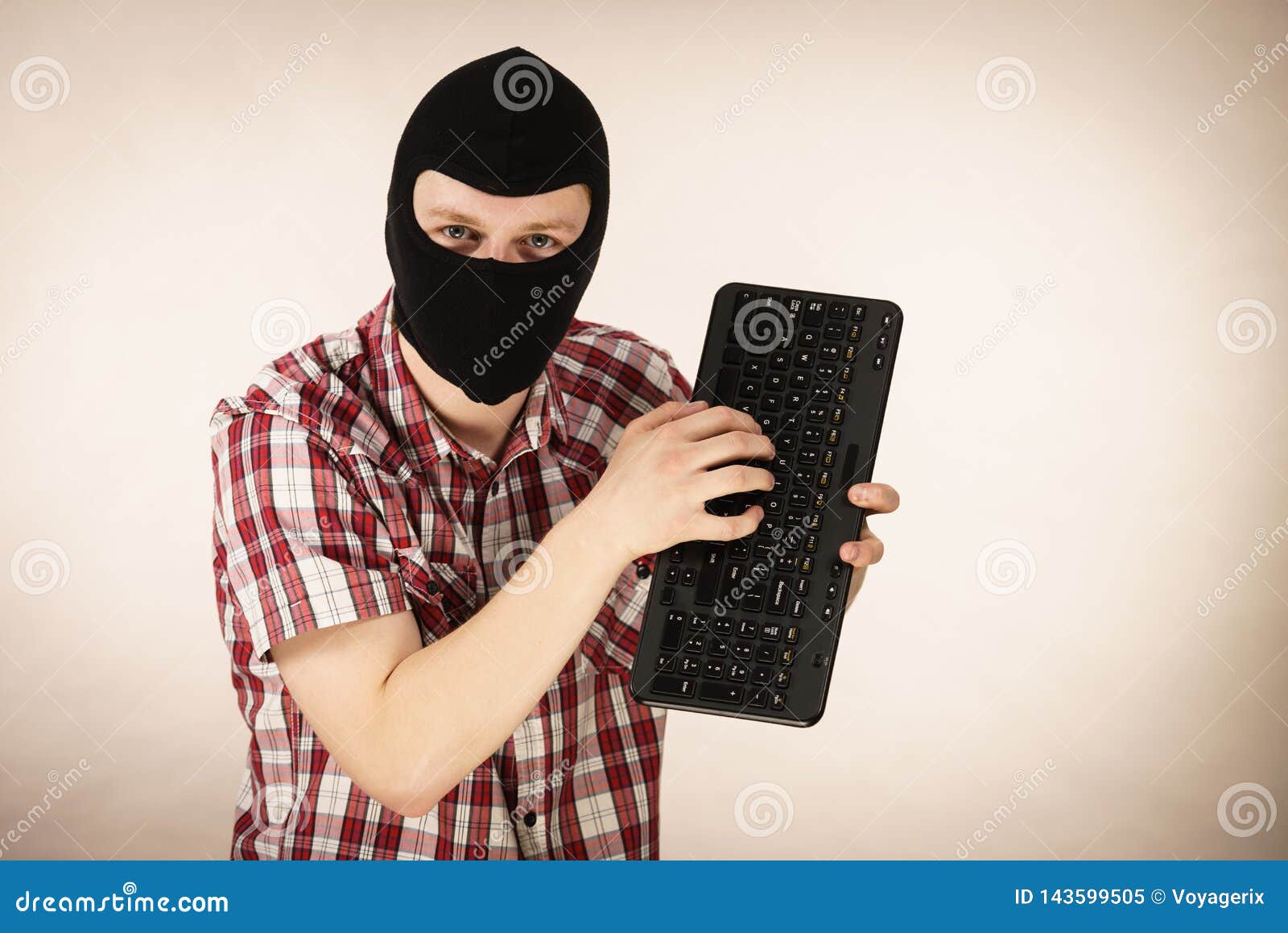 Man Wearing Balaclava Holding Keyboard Stock Image Image of