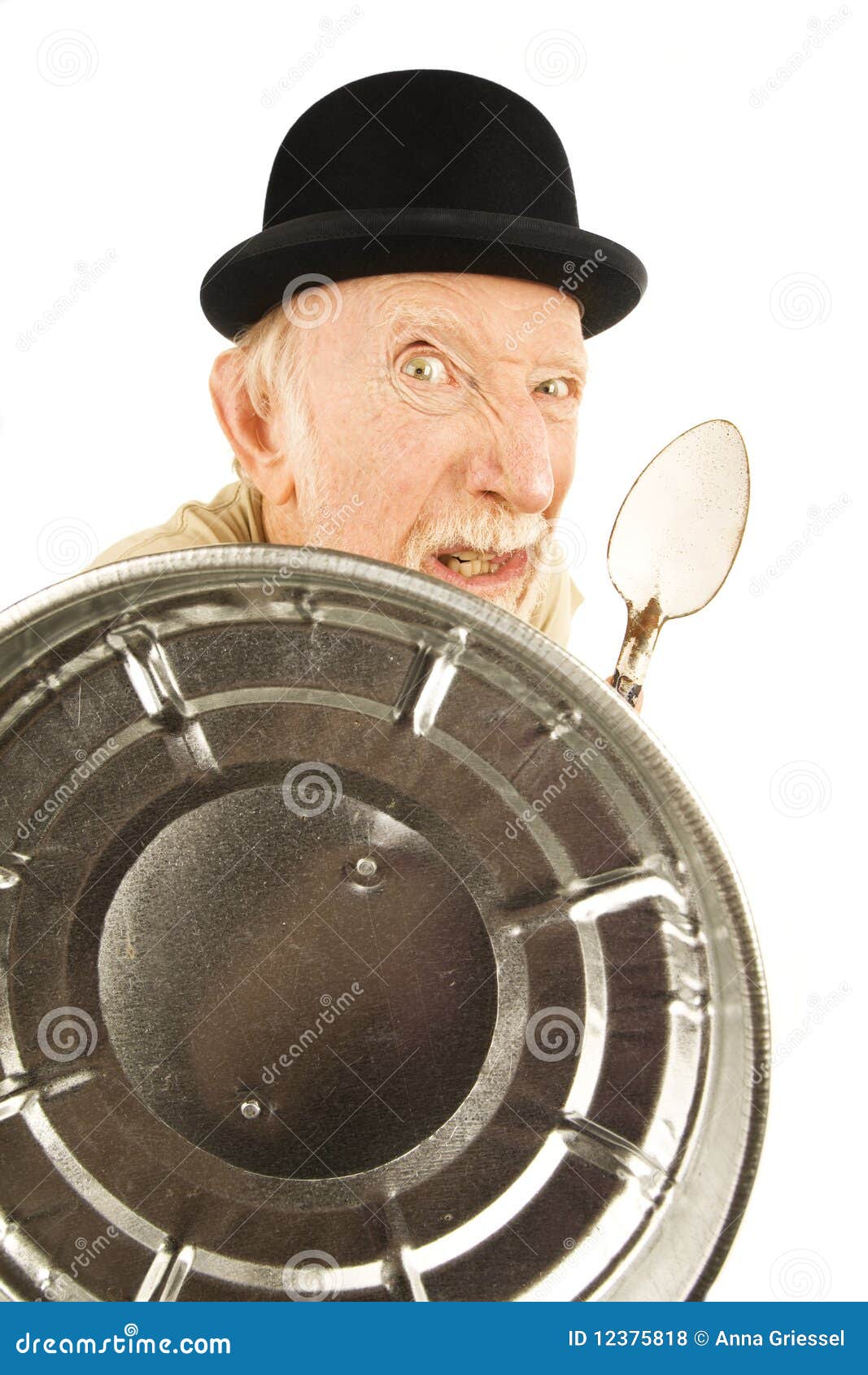 Crazy Man Defending Himself with Can Lid and Spoon Stock Photo Image