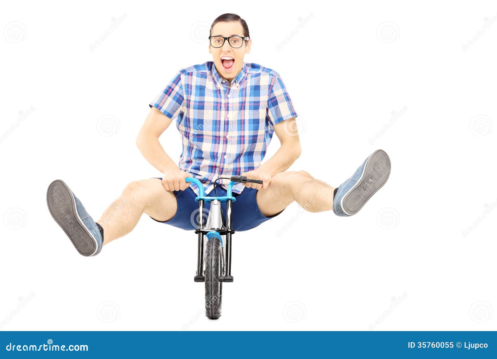 Crazy Young Man Posing on a Small Bicycle Stock Image Image of object