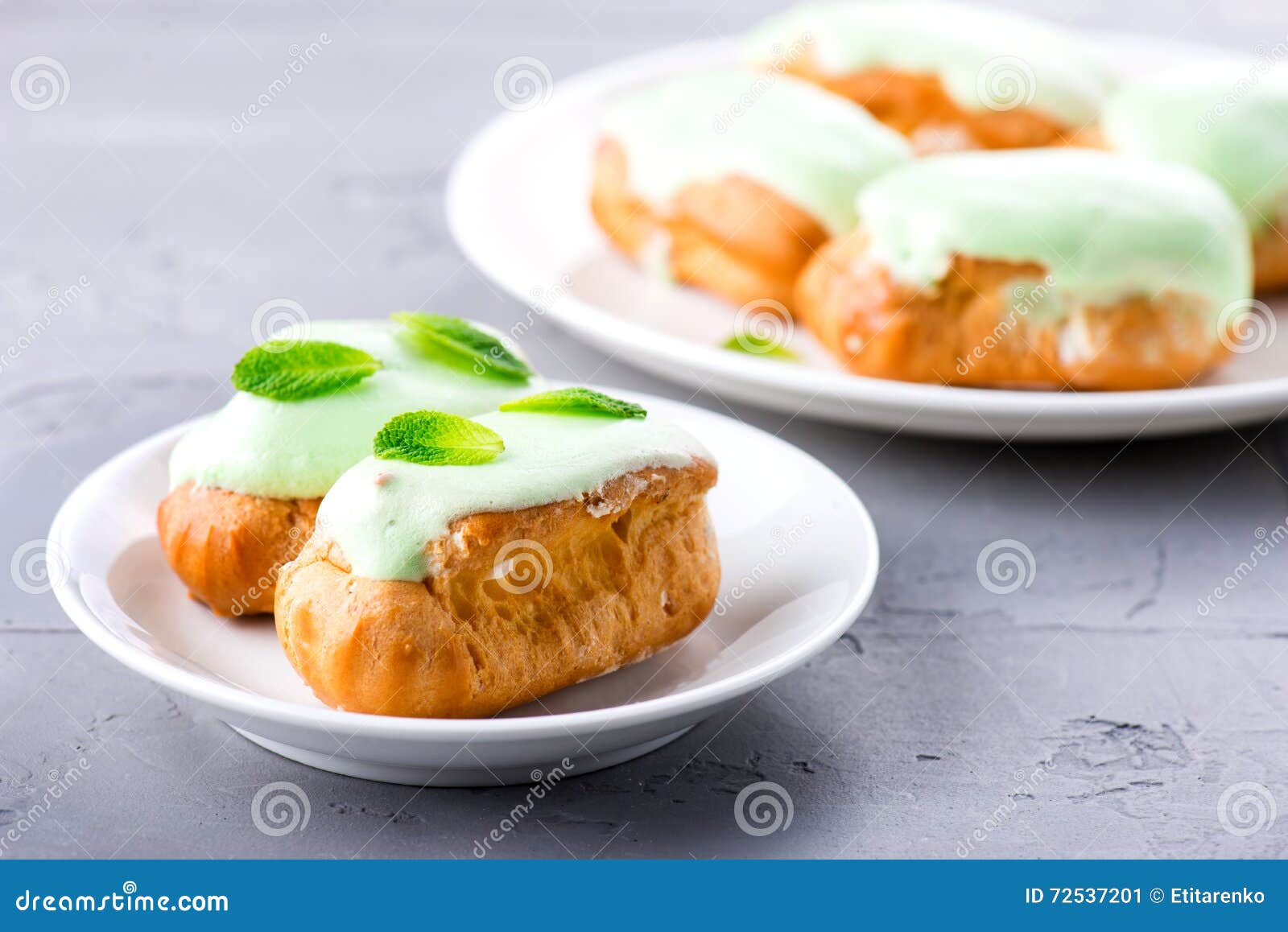 Cream Dessert Eclair with Fresh Mint Leaves Stock Image Image of