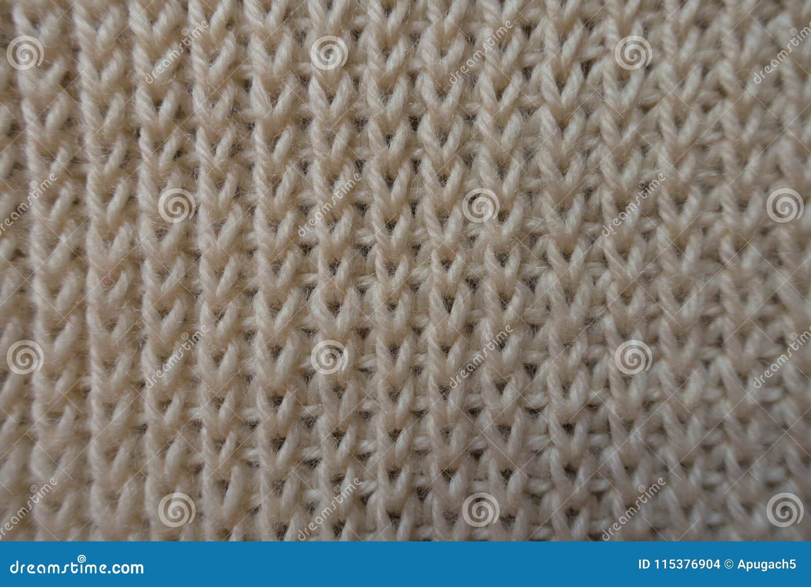 cream knitted fabric from above ribbing pattern