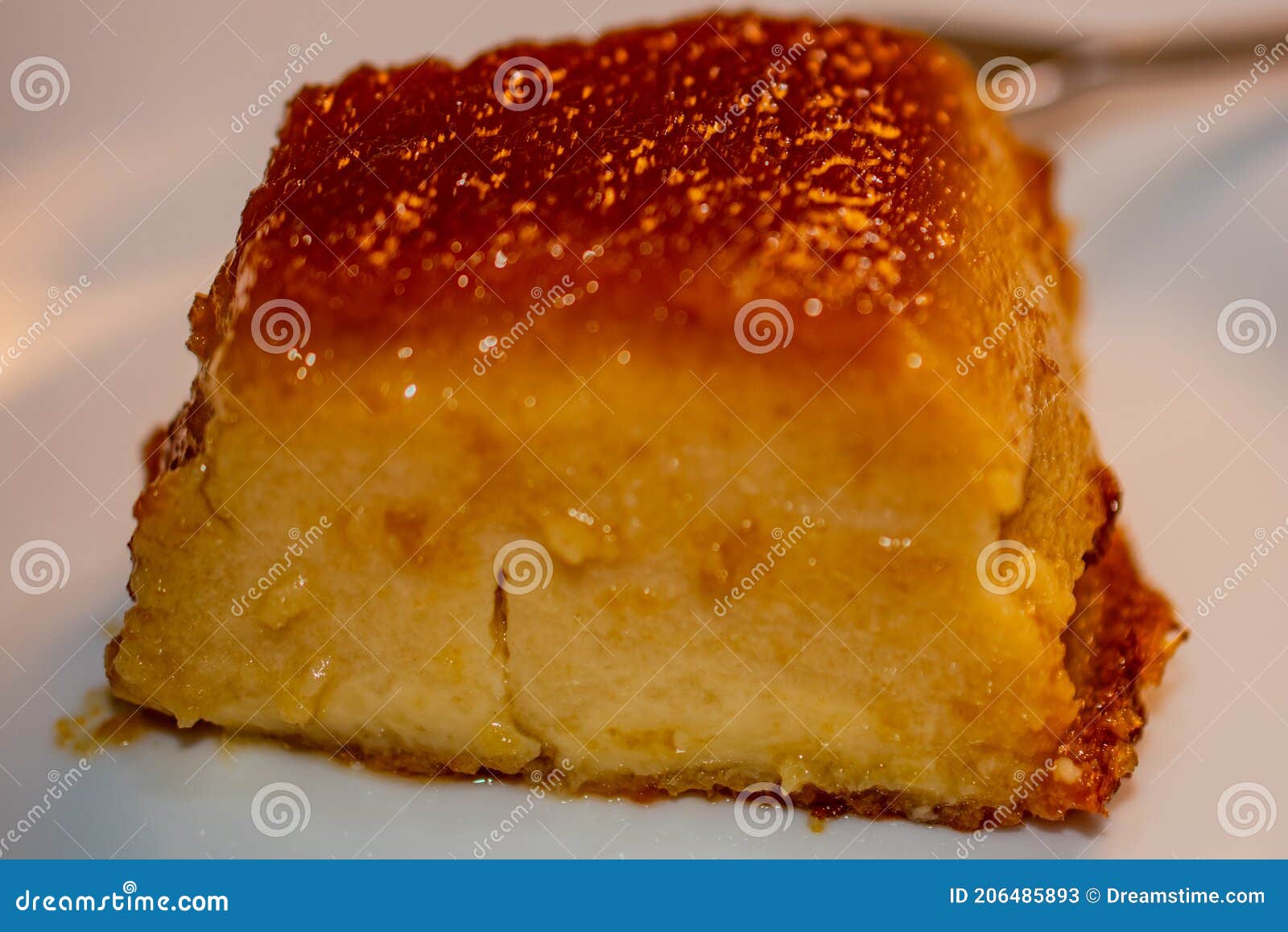 Creamy Bread Pudding with Caramel Sauce. Selective Focus. Stock Image