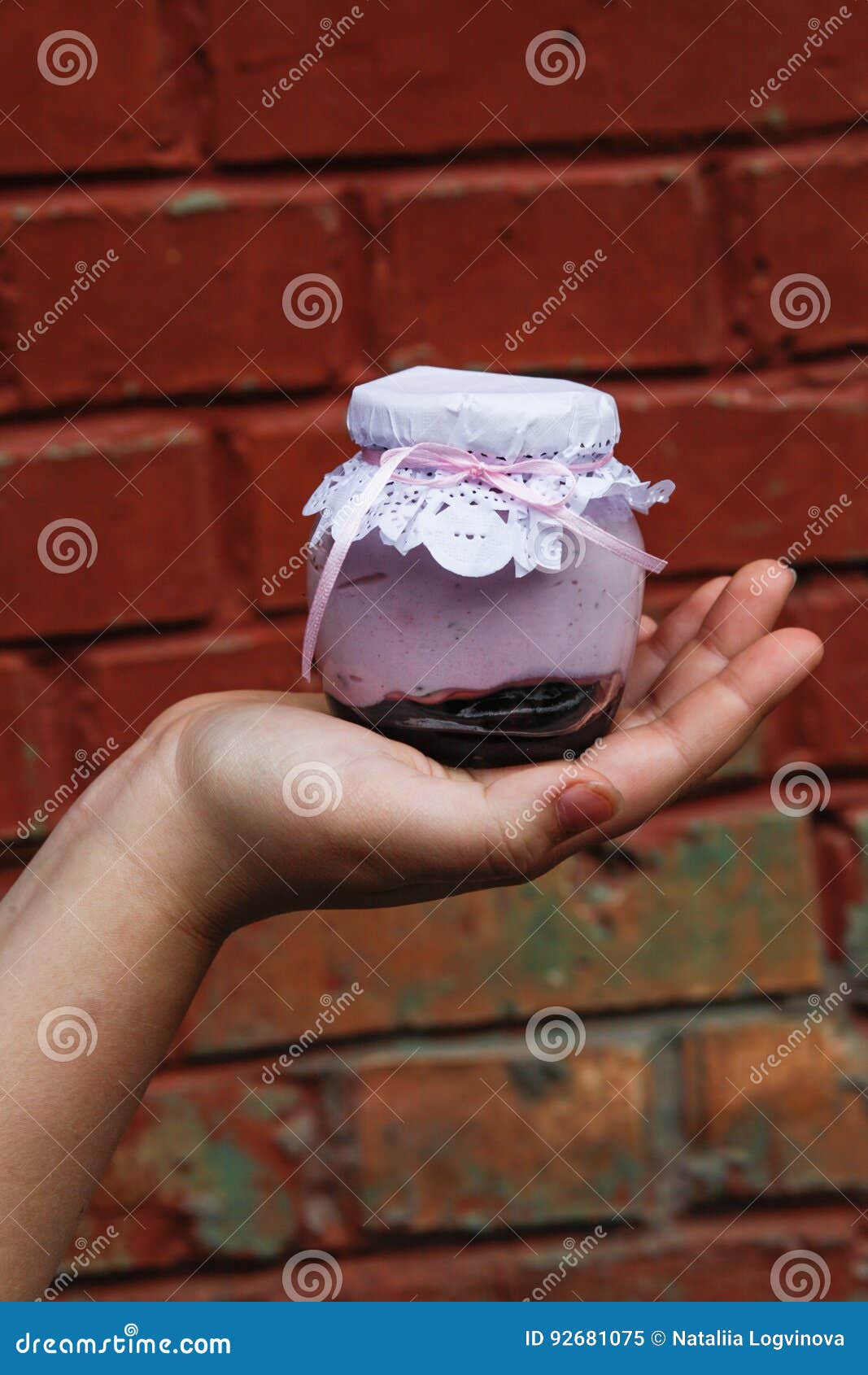 Creamy Dessert In A Small Glass Jar With Decoration And