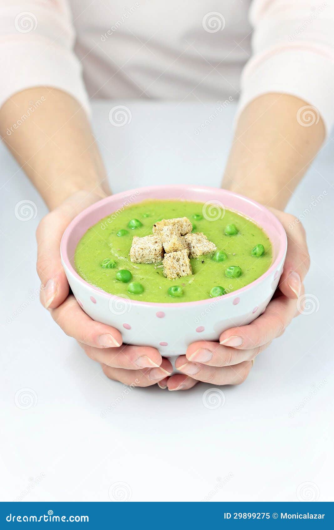 Creamy Pea Soup stock image. Image of bowl, handheld 29899275