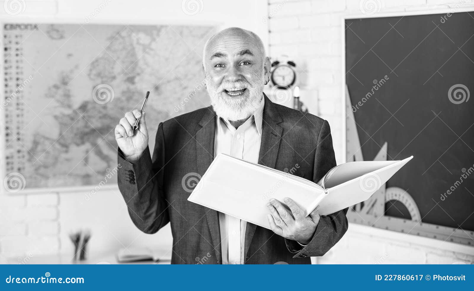 create a distraction free study environment. math education in school. bearded man give marks. write notes in book