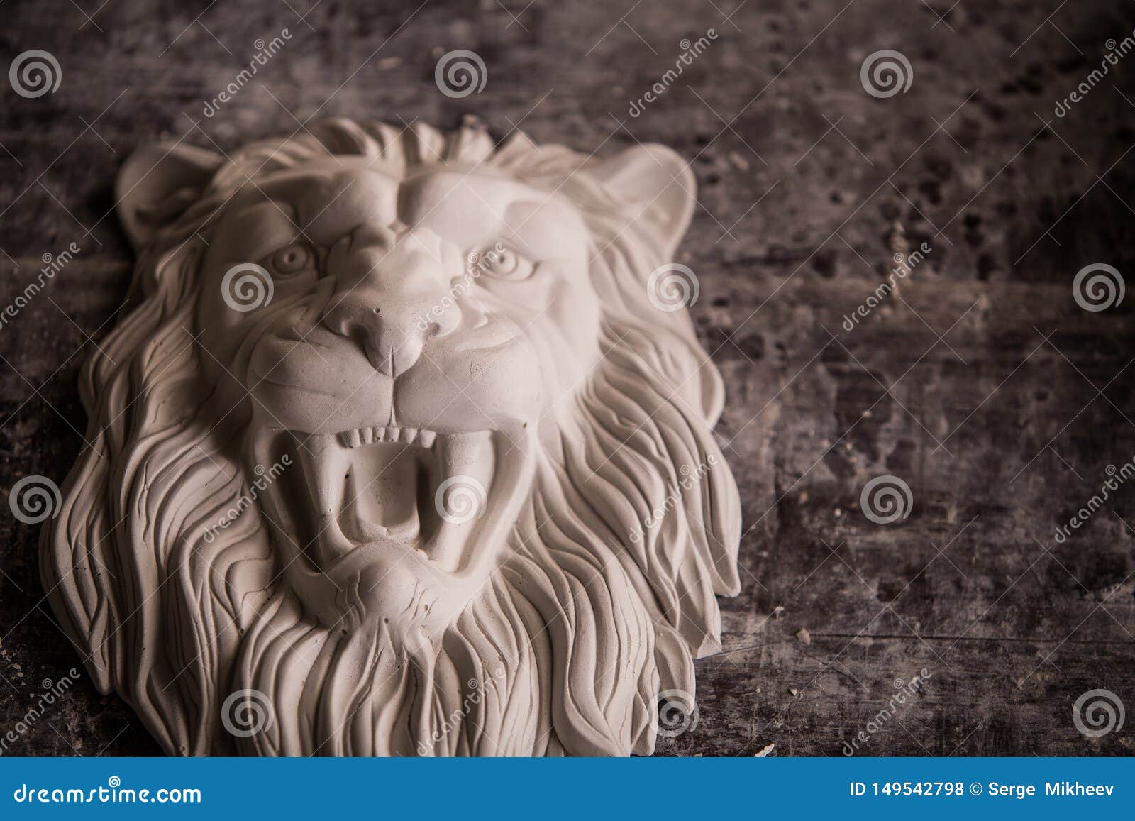 Creation of Sculpture from Plaster. Lion`s Head. Plaster Stock