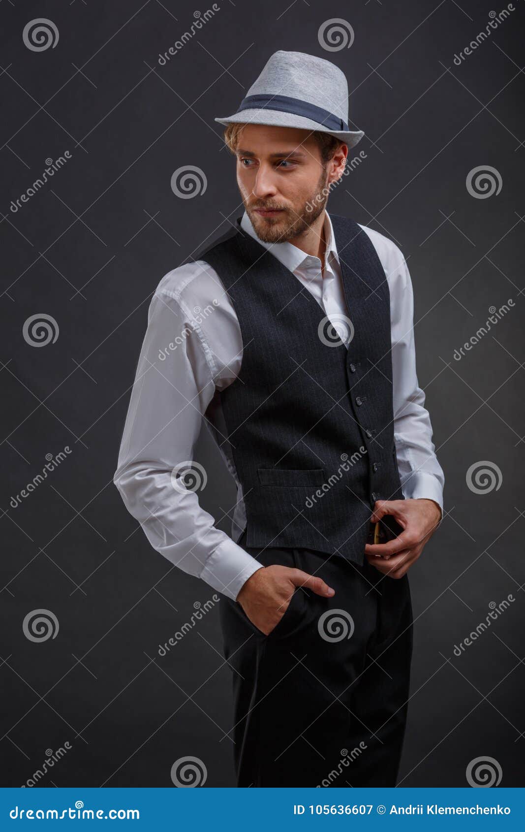 A Creative Guy, In A Suit Hat, Stands Sideways And Looks Back. Stock ...