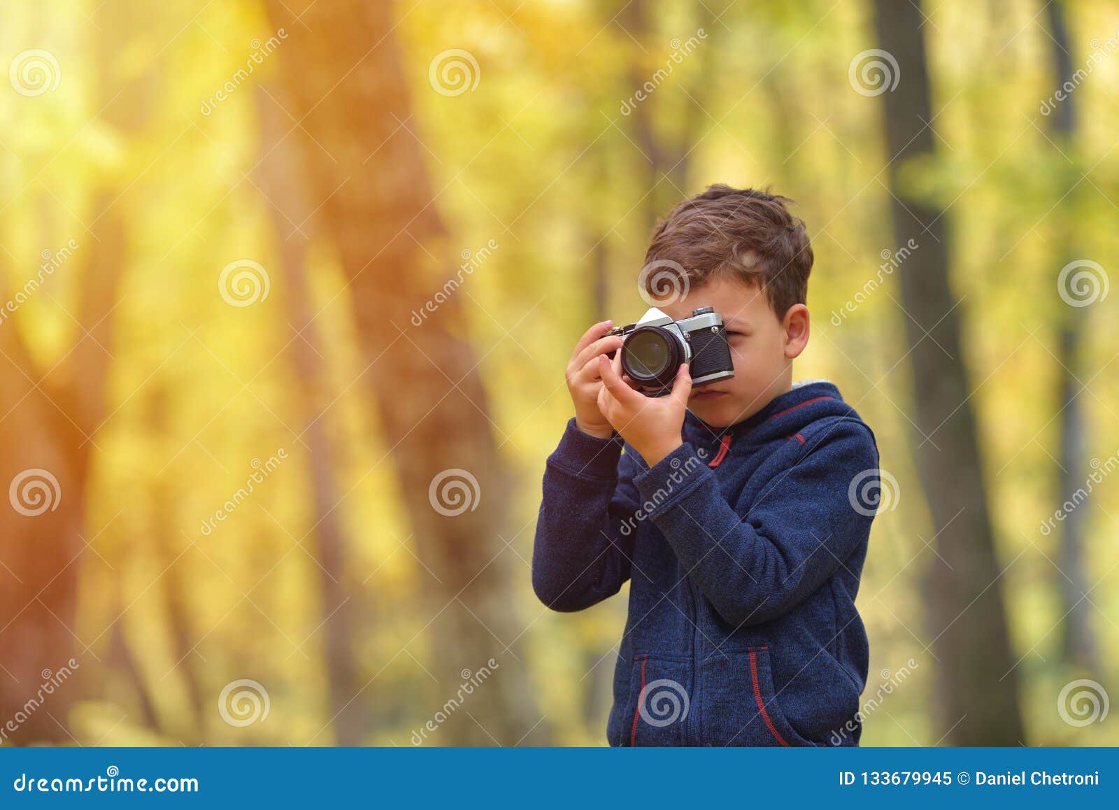 Creative Child, Kid Photographer a Little Boy with a Camera Ta Stock