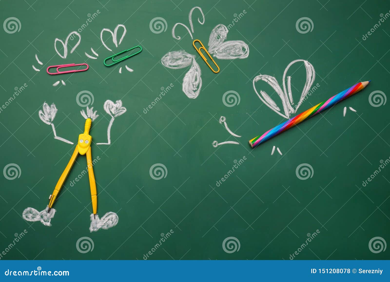 Creative Composition with School Stationery on Chalkboard Stock Photo