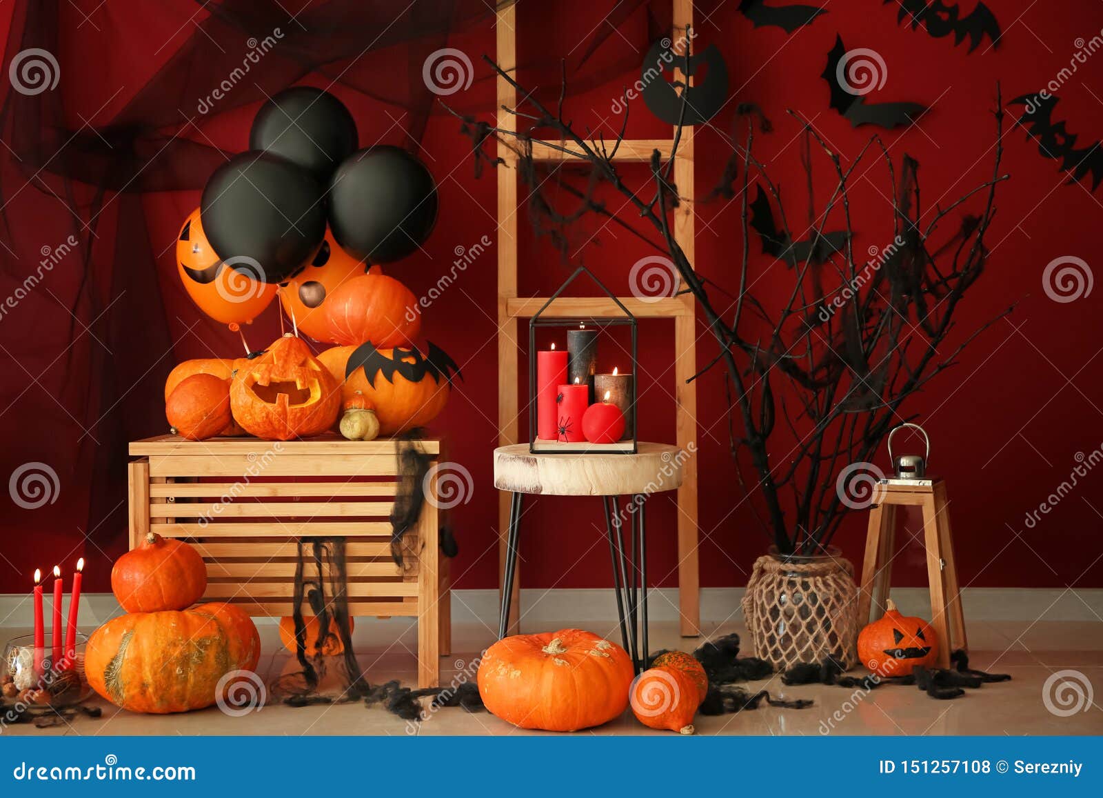 Creative Decorations for Halloween Party Near Color Wall Stock Photo