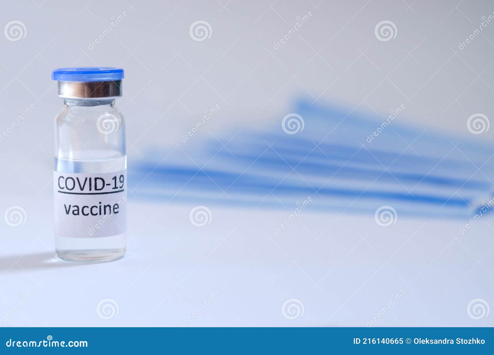 https://thumbs.dreamstime.com/z/creative-ideas-vaccination-concept-top-view-syringe-medical-masks-vaccine-vial-glass-bottles-vaccination-216140665.jpg