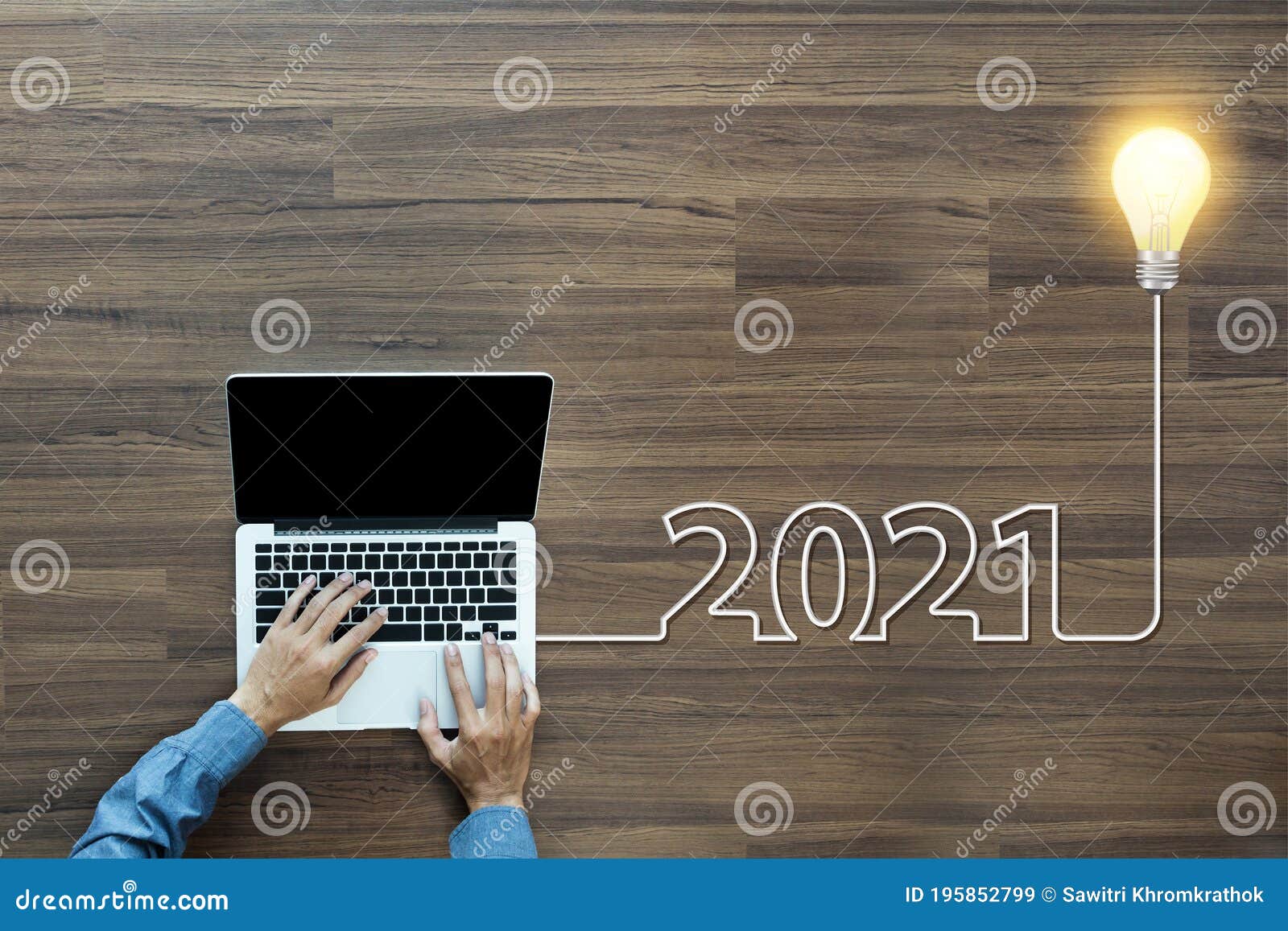 Creative Light Bulb Idea 2021 New Year, with Businessman Working on Laptop Stock Image Image