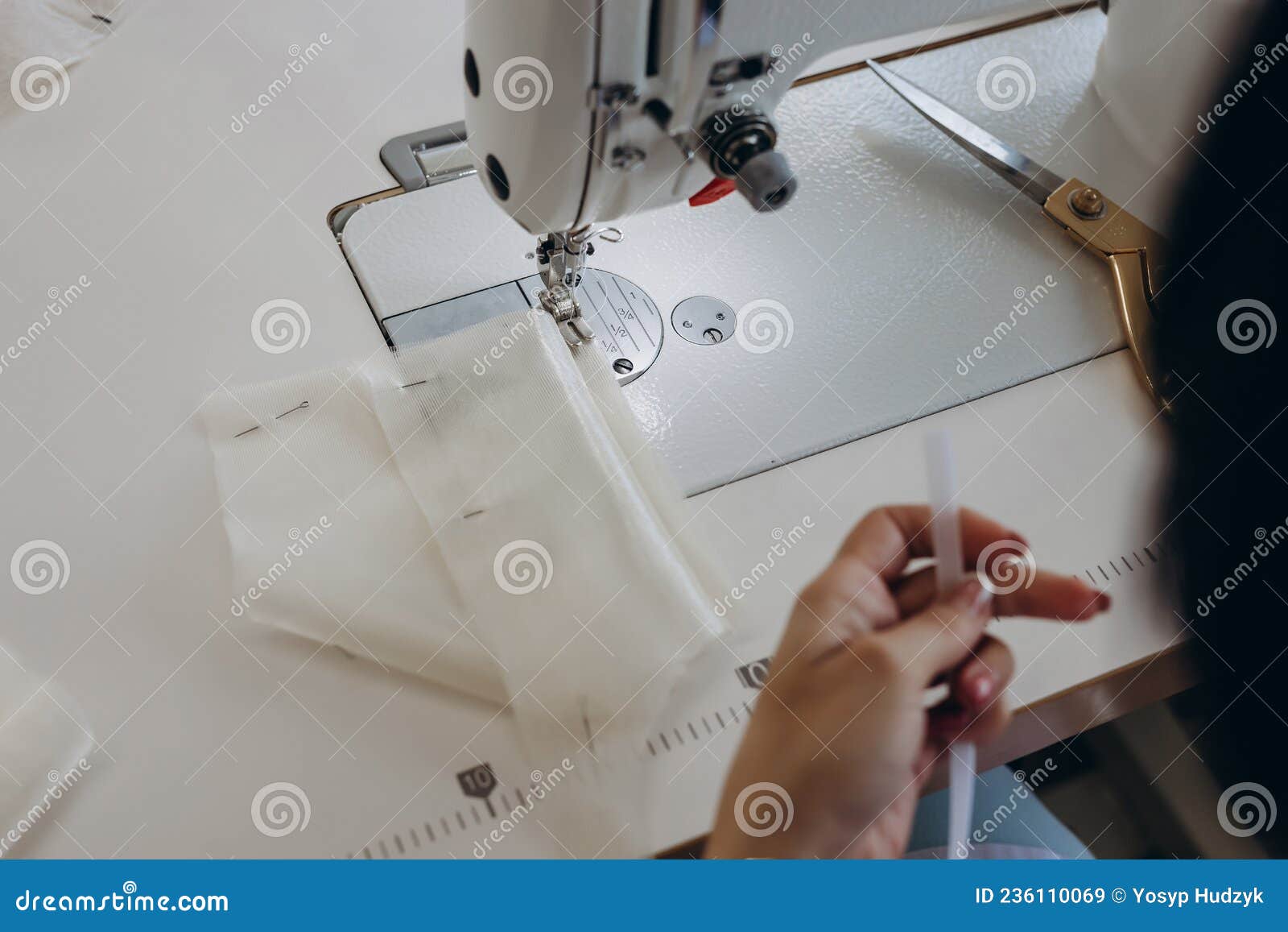 A Creative Master is Making Dress on the Dressmaking Table Stock Image