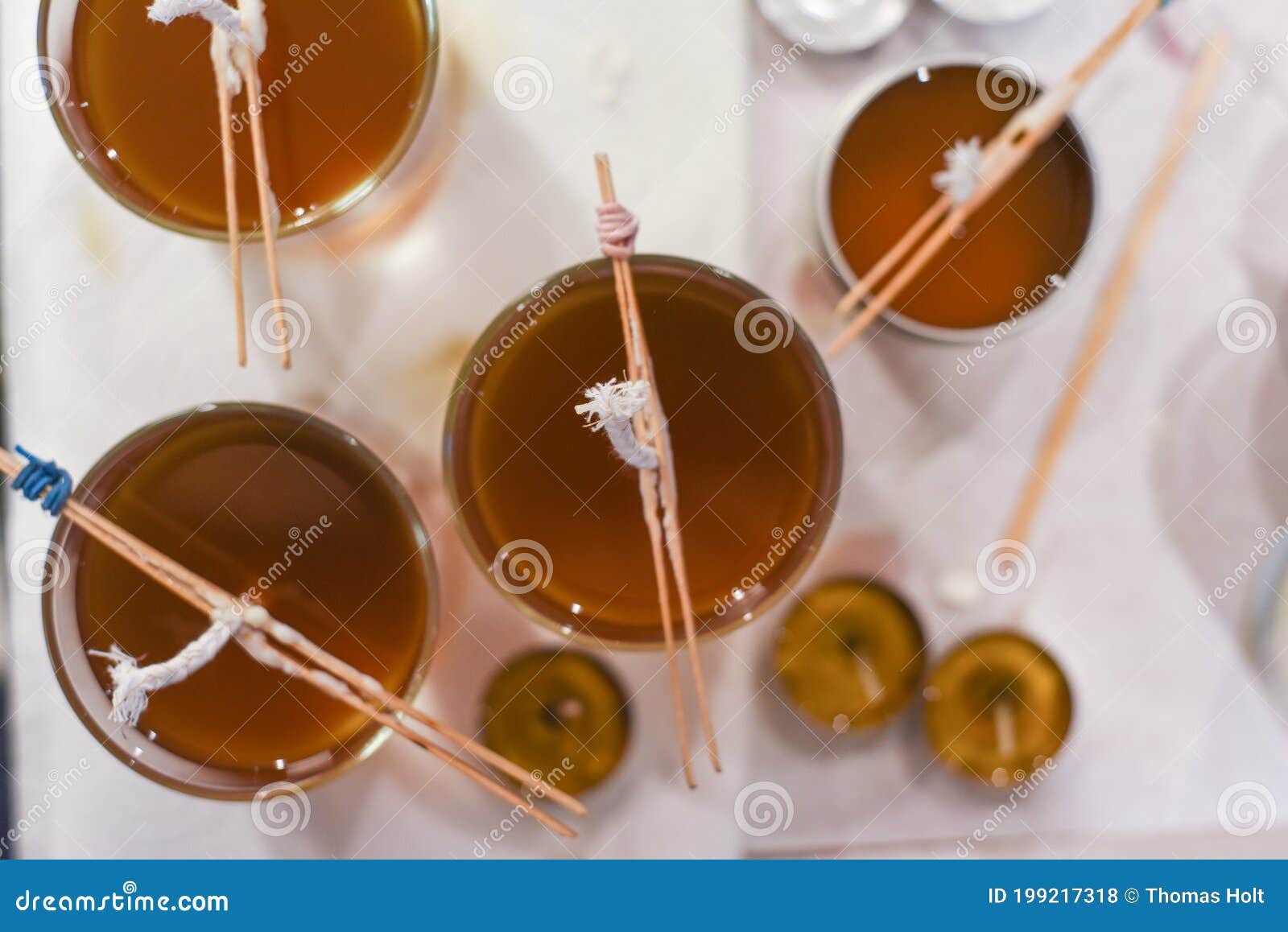 Creative Occupation of Candle Making Showing the Pouring of Liquid Wax