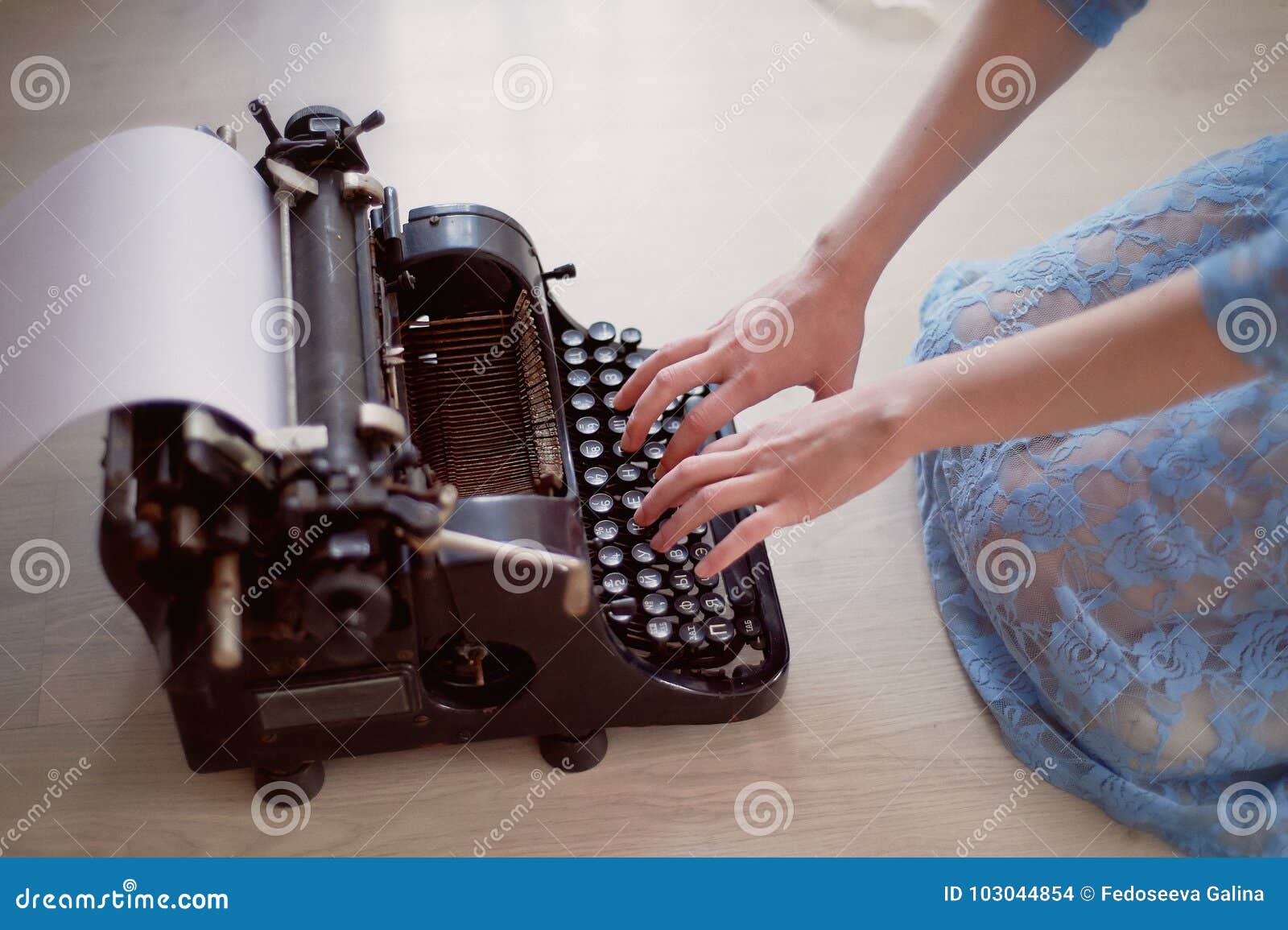 a creative person, author of books, writer of bestsellers,a journalist typing on an old typewriter. inspiration in the