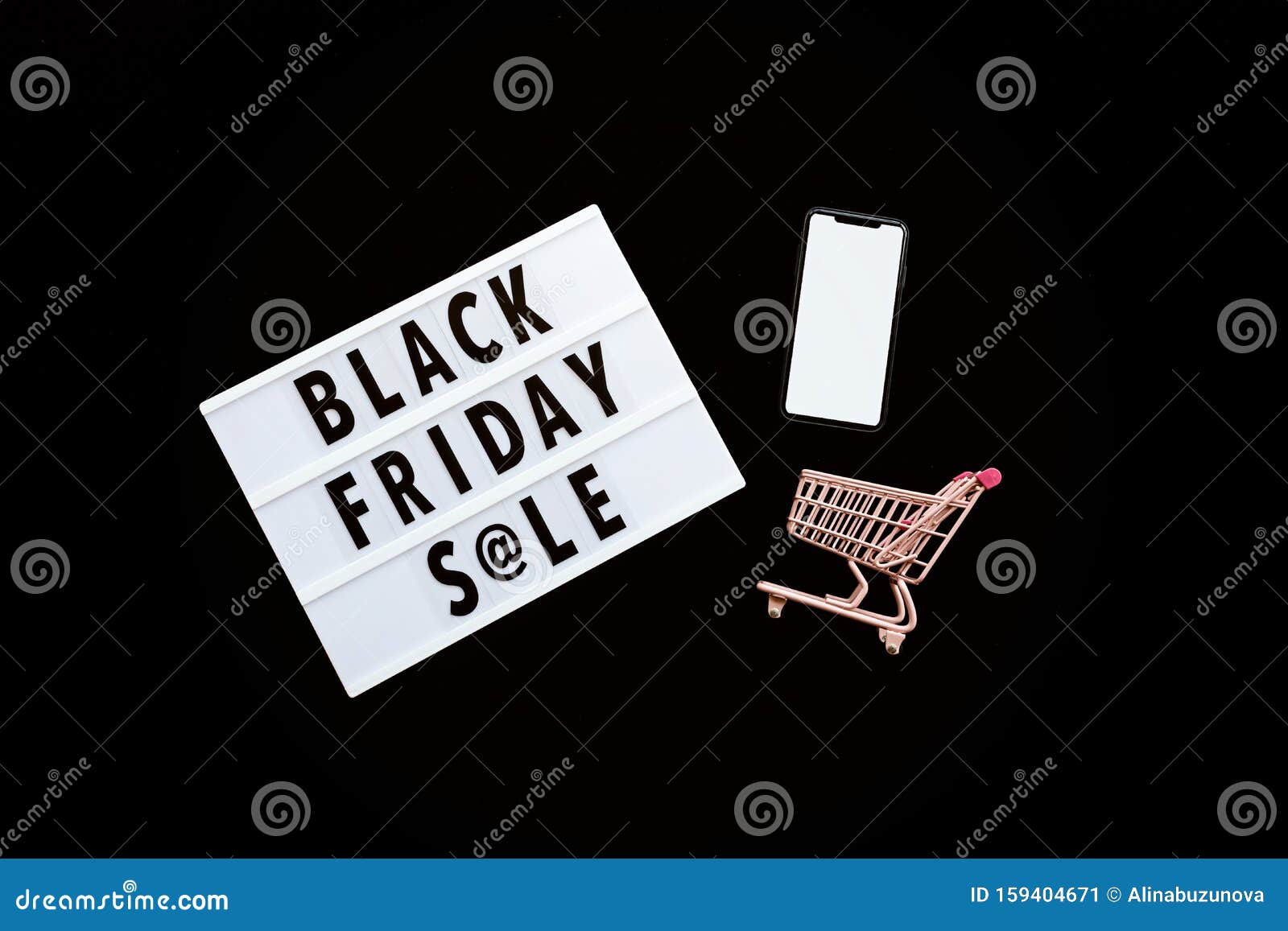 creative promotion composition black friday sale text on lightbox on black background, next grocery trolley, mobile phone. flat