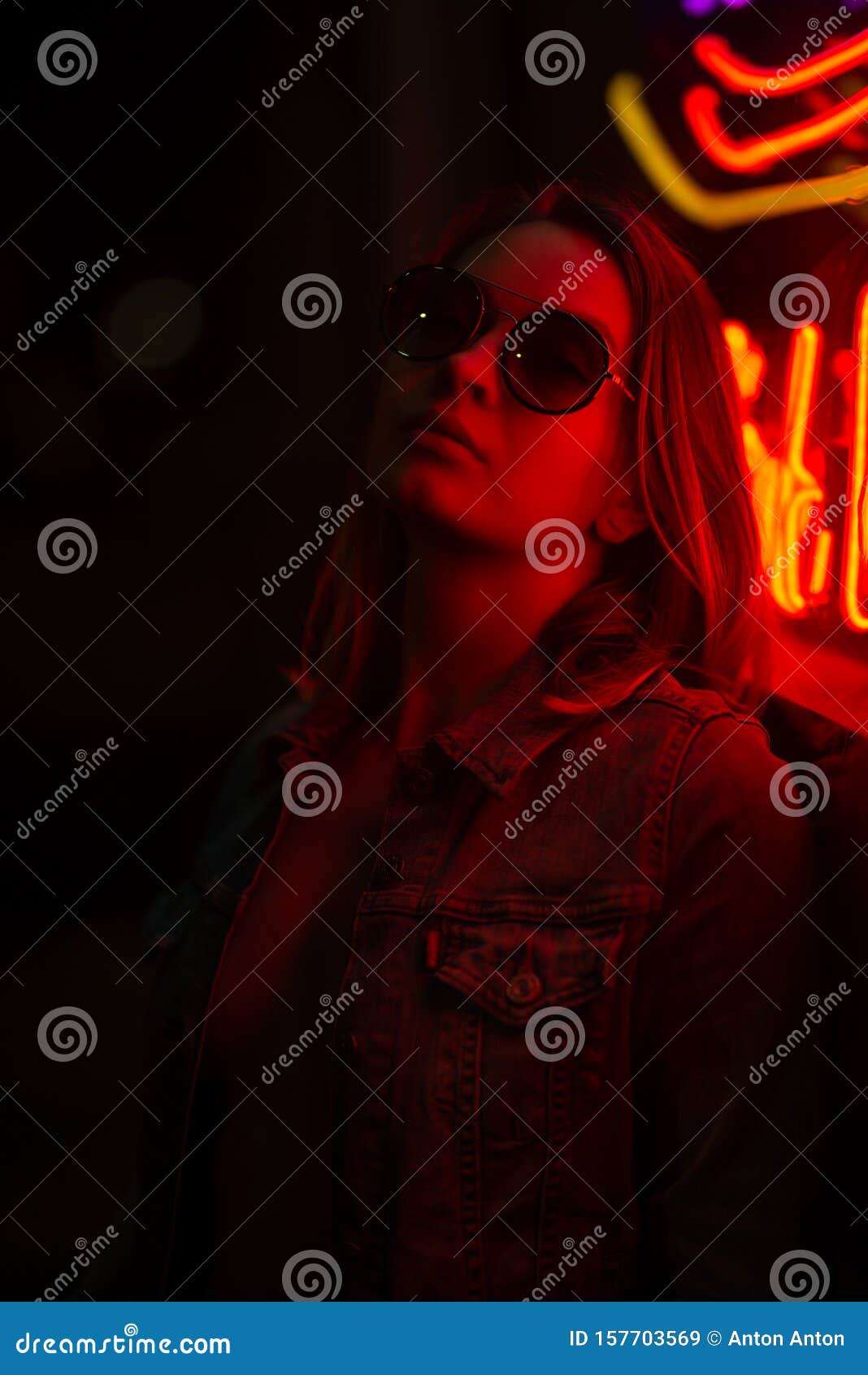 Creative Sexual Portrait of a Girl in Neon Red Glasses, Night Party, Dancing, Game Business, Striptease