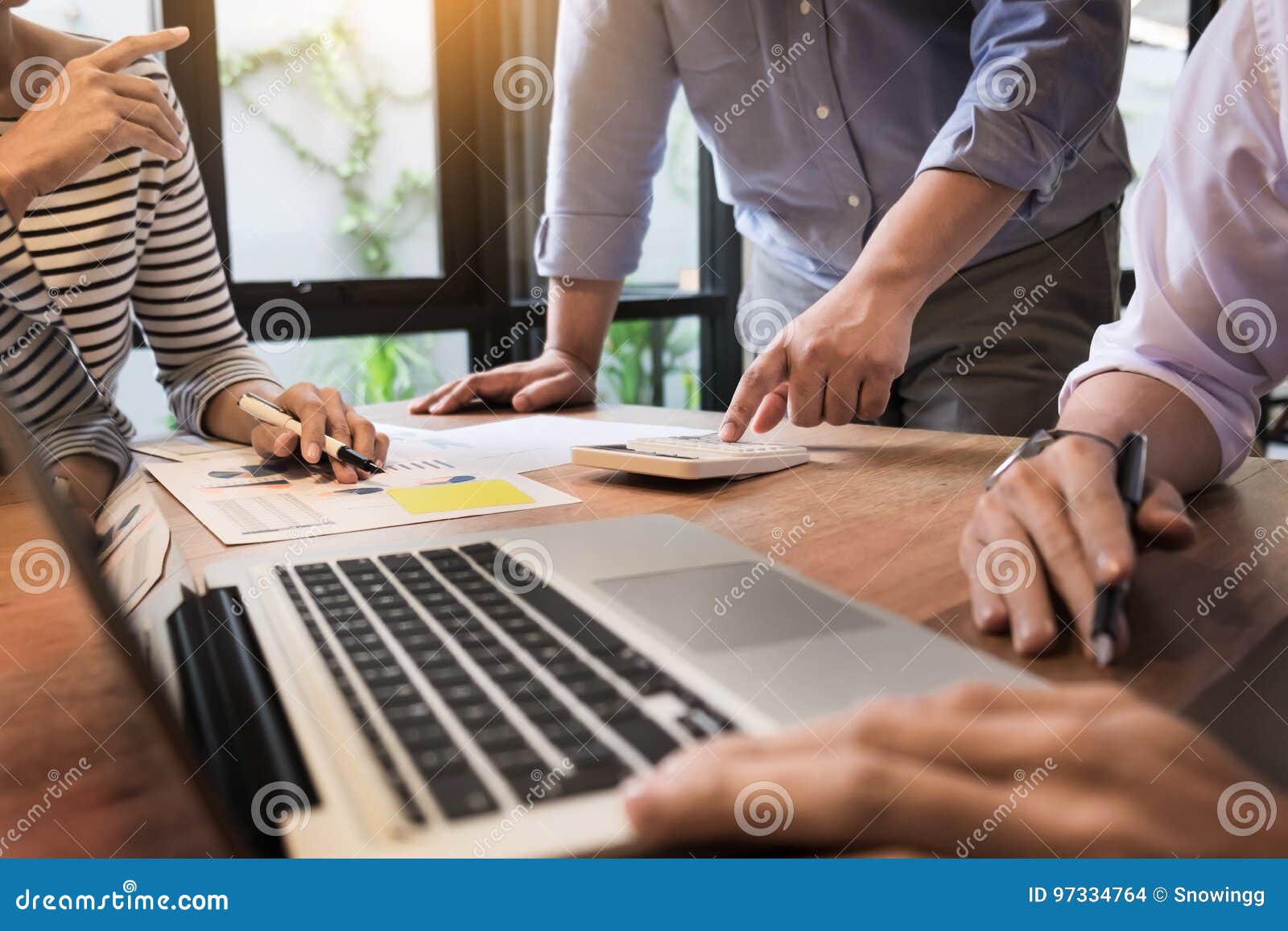 Creative Team Job. Young Business Man Working with Startup Project Analyse Graph Plans and