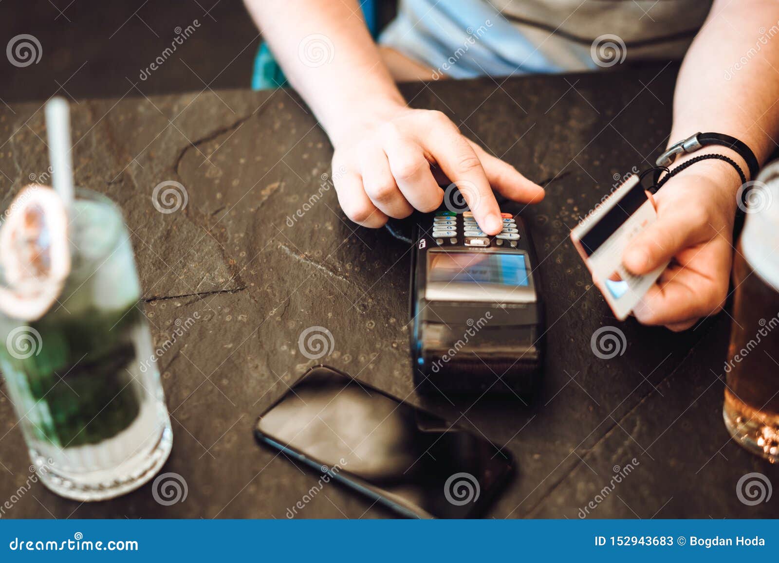 Credit Card Payment At Restaurant. Man Entering Pin Code For Credit Card Purchase Stock Image ...