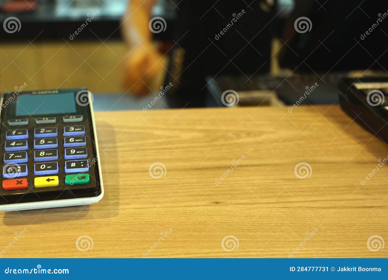 A Credit Card Reader on the Tables for Service a Customers Stock Image