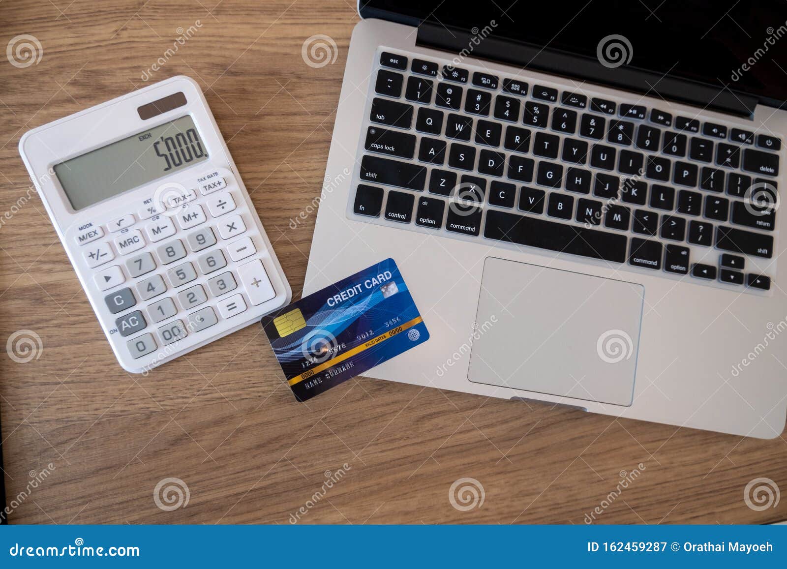Credit Cards, Calculators and Laptops are on the Desk Stock Image