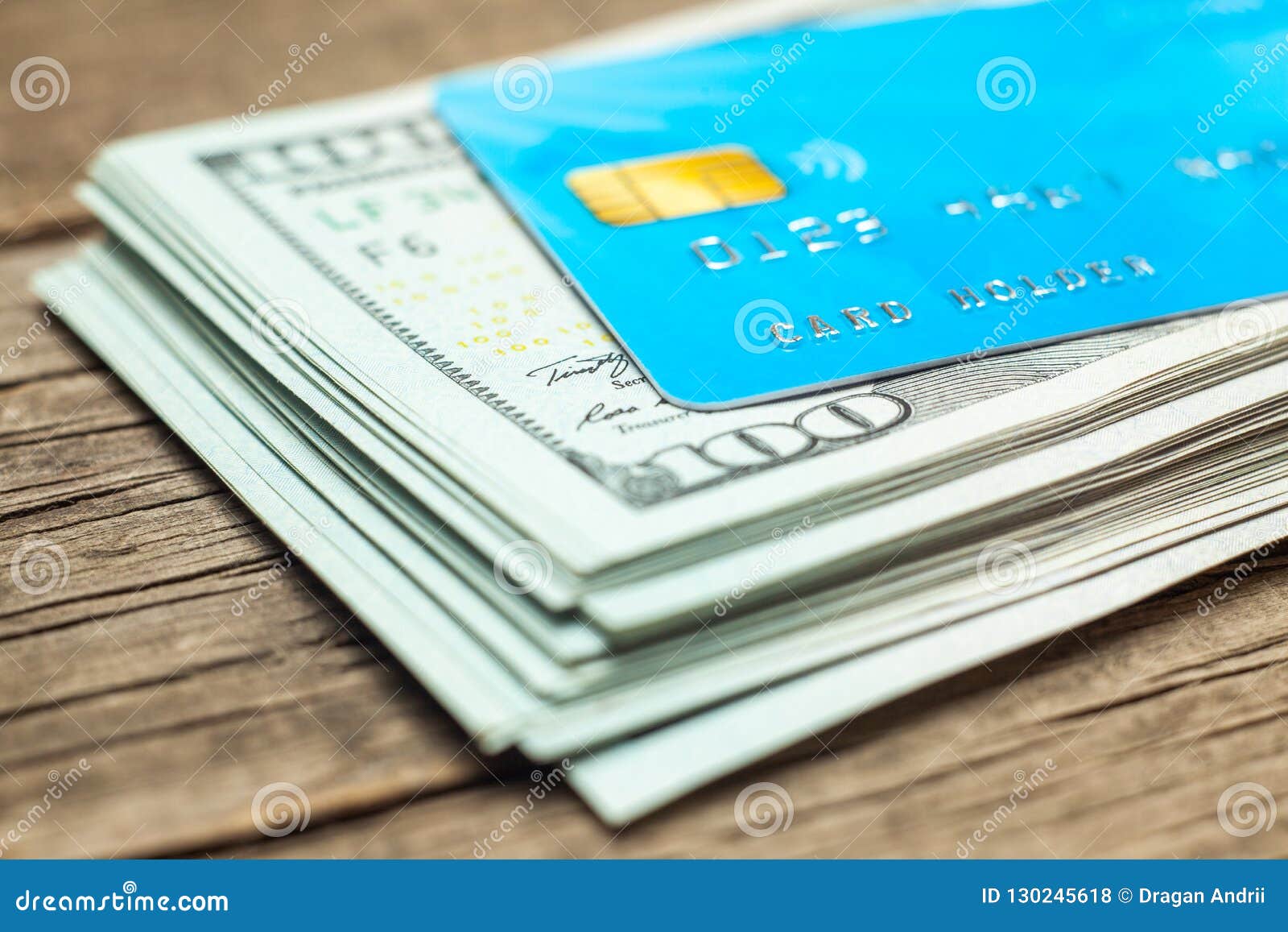 Credit Cards And Stack Of Banknotes 100 Dollars In Cash. Electronic