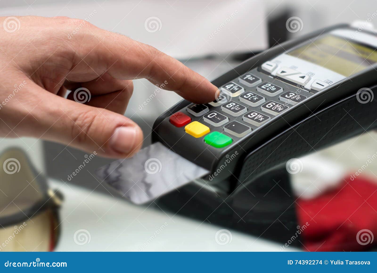 credit or debit card password payment. customer hand is entering