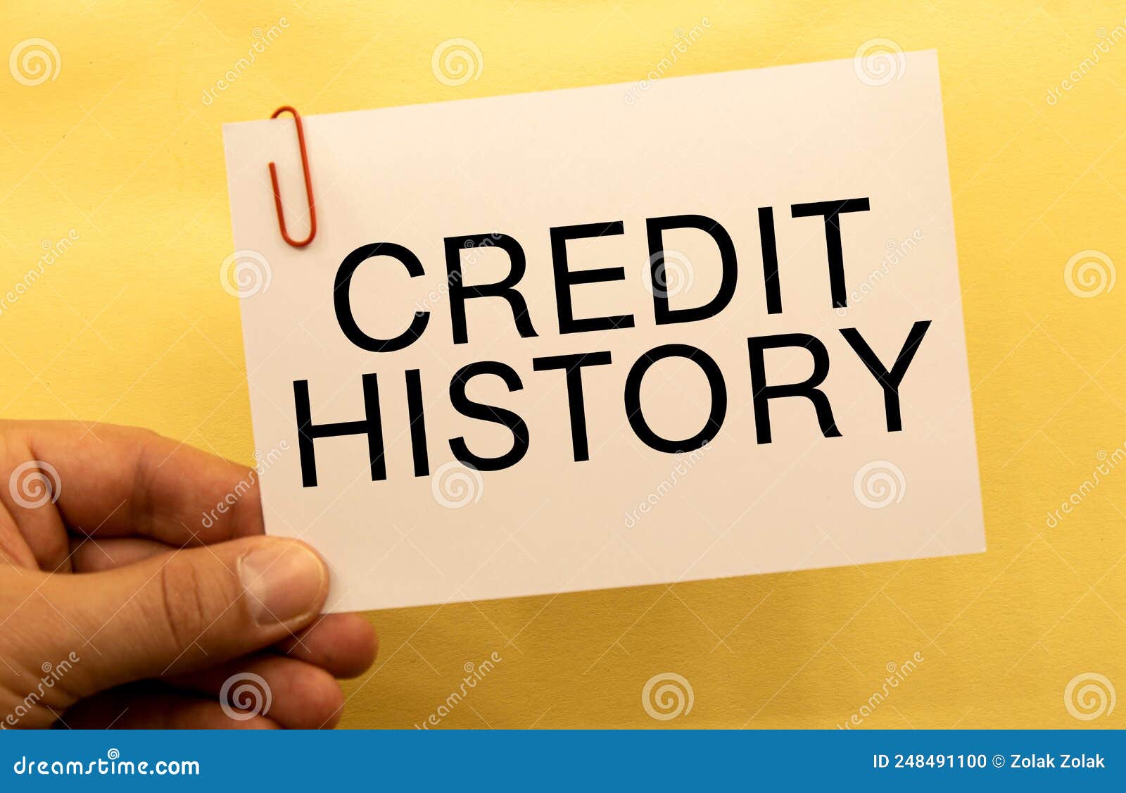 Credit History. Text on White Paper on Wood Table Background Stock