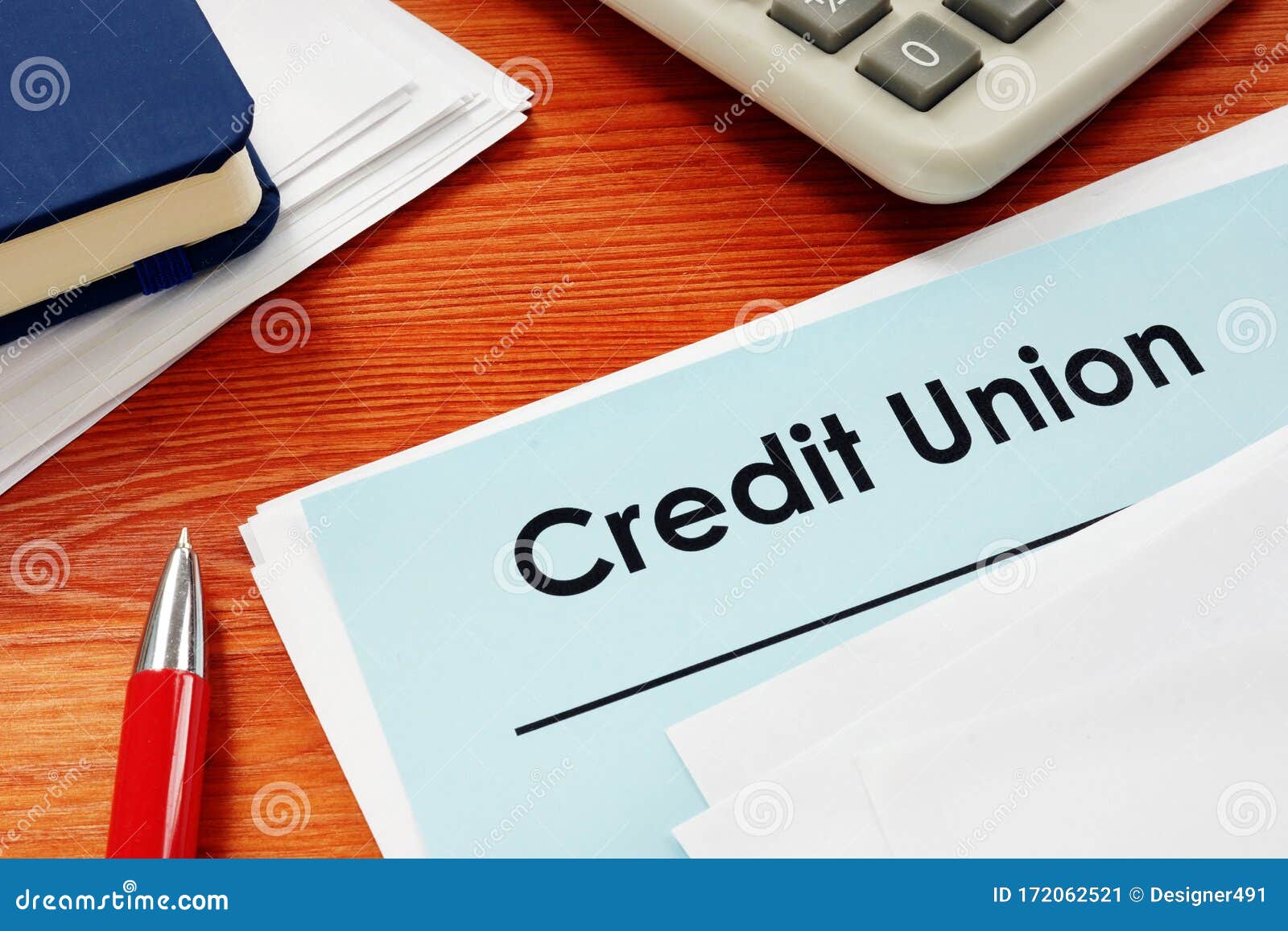 credit union papers for loan on desk