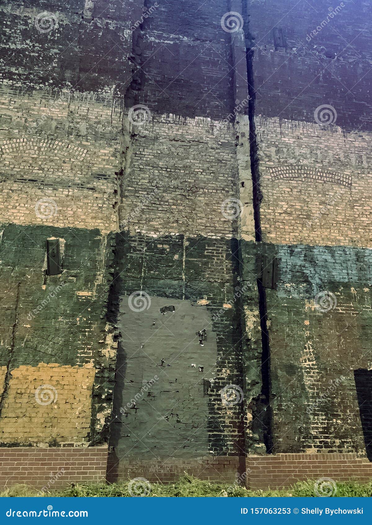 creepy old, abandoned building with painted over bricks in downtown chicago loop